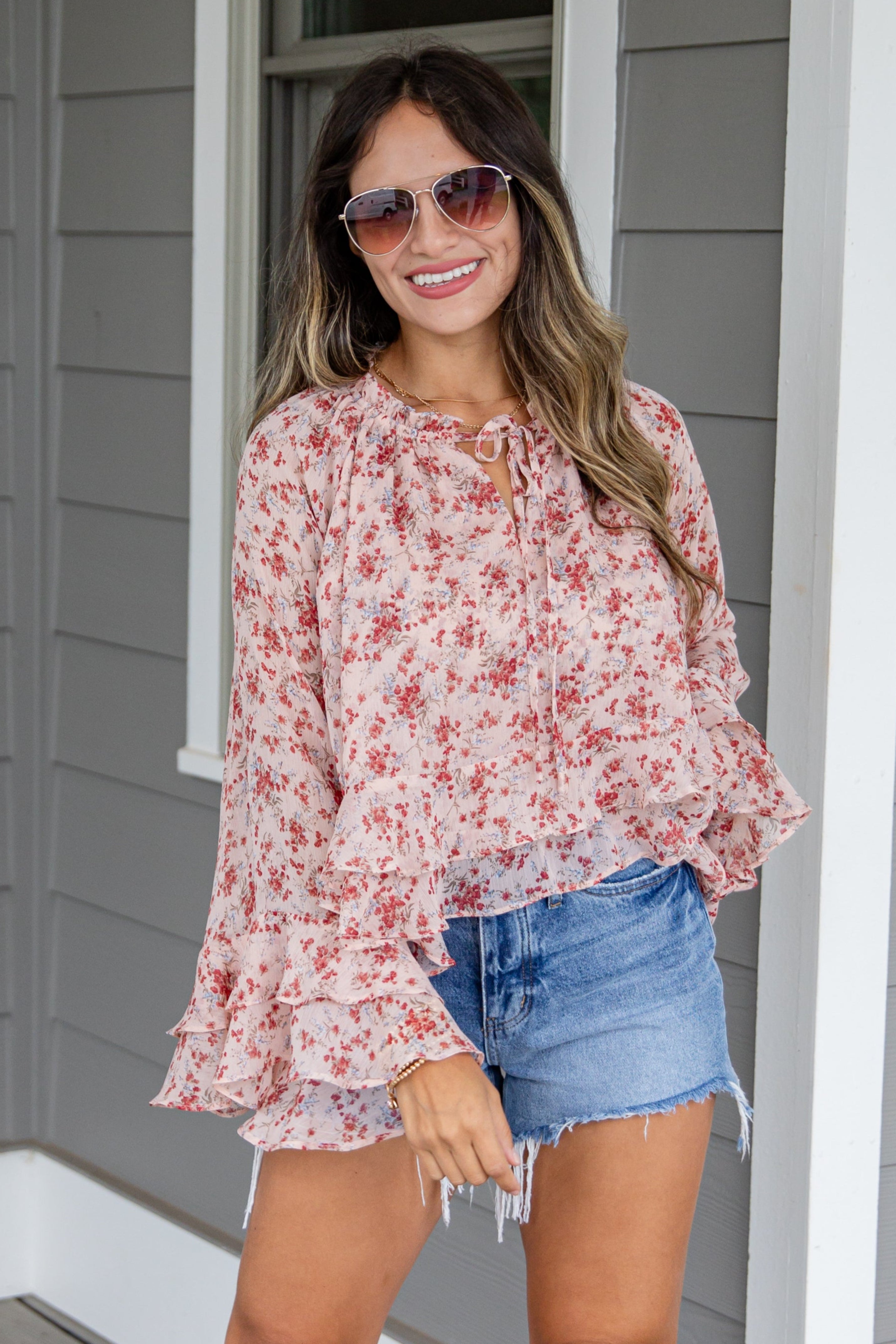 pink floral blouse