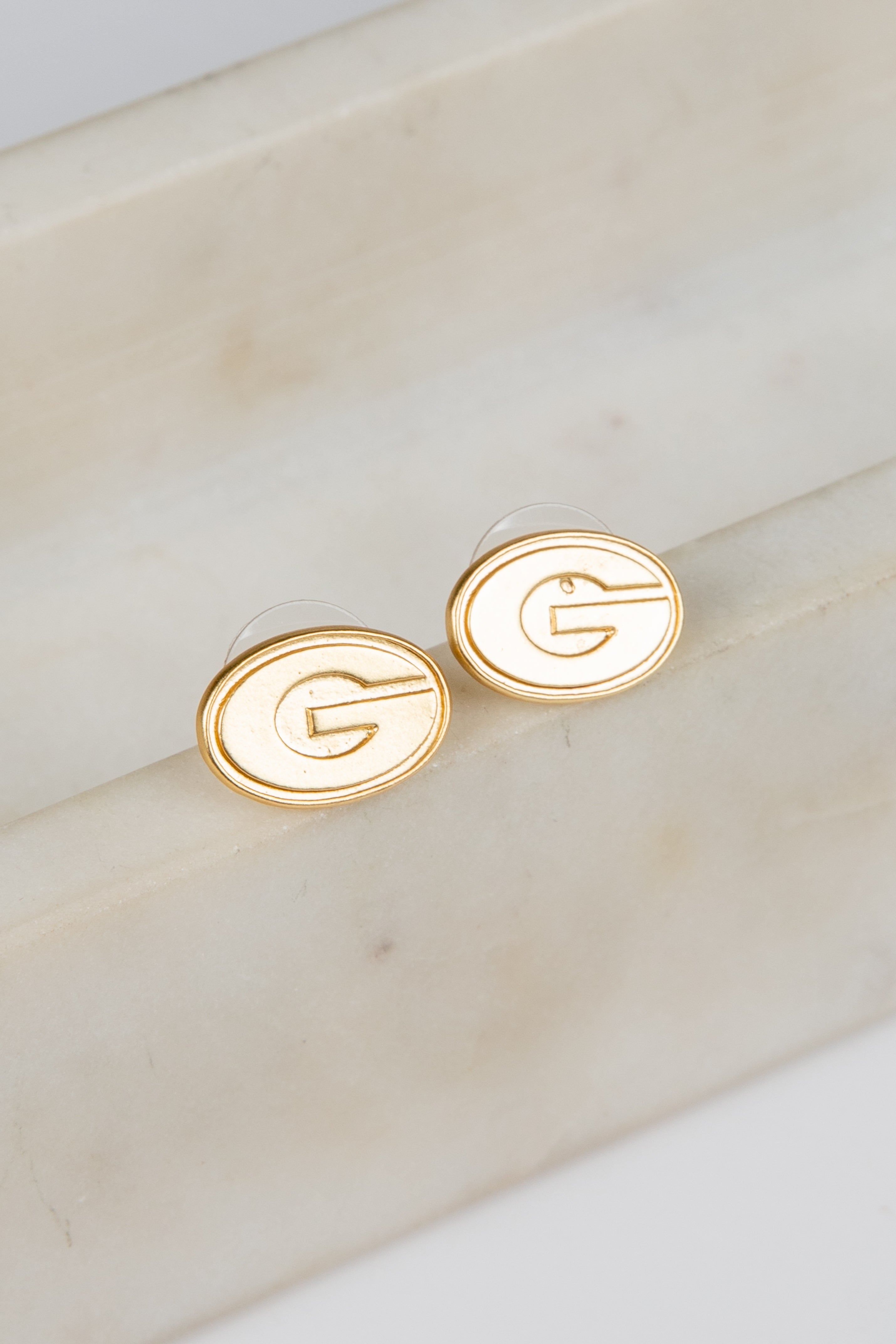 Gold earrings with &