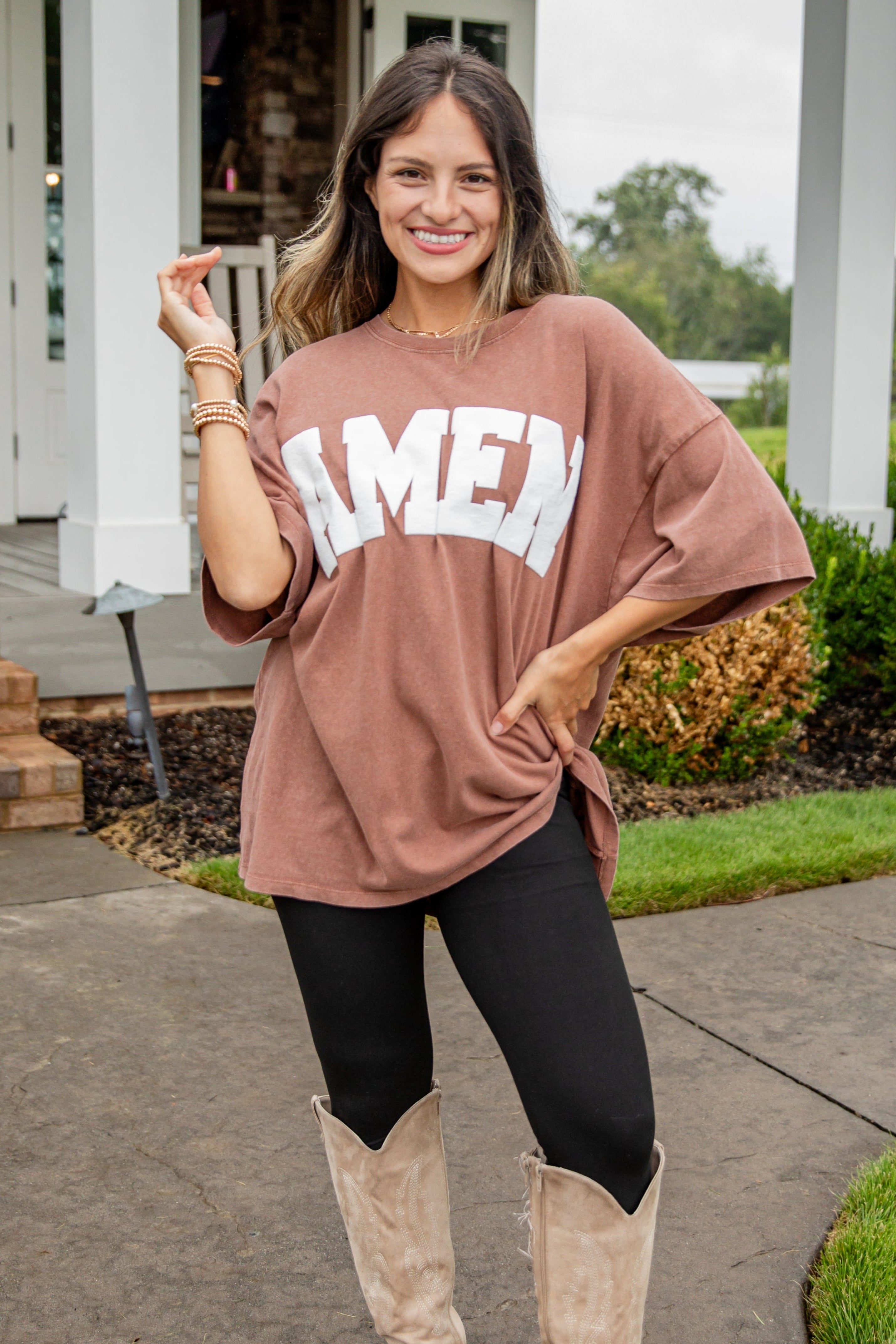 Woman wearing a brown oversized &