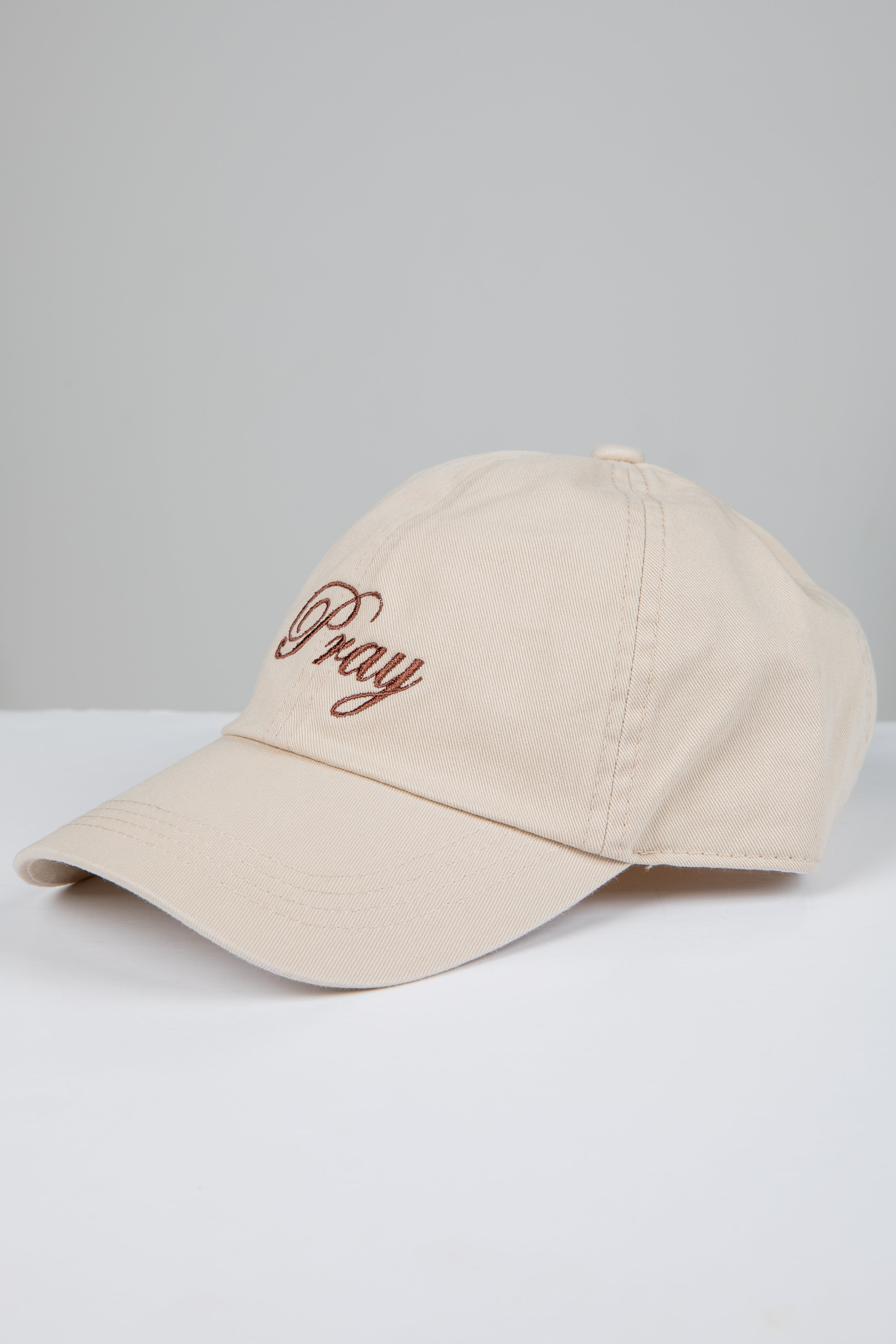 Beige cap with &