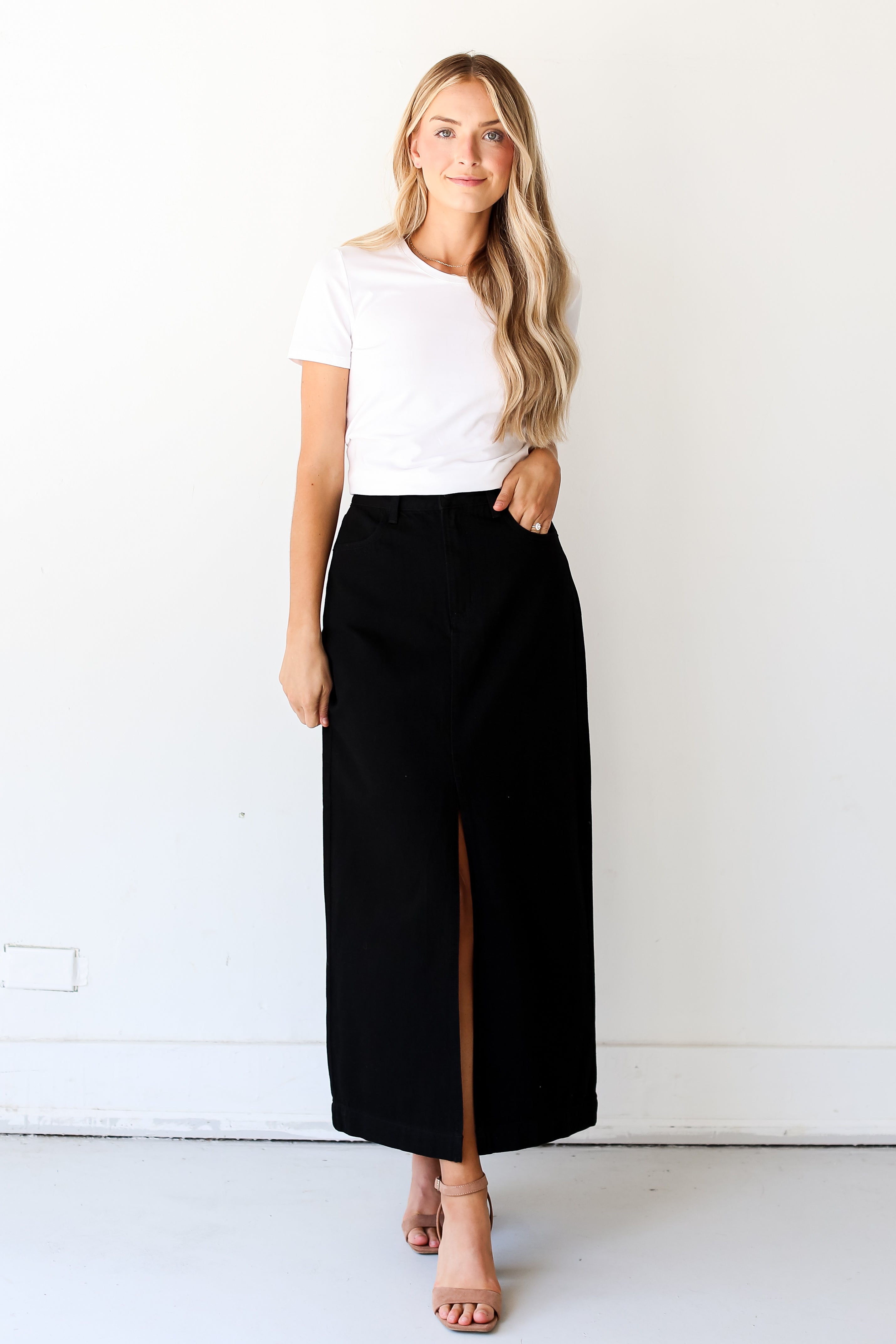 model wearing a Black Denim Maxi Skirt