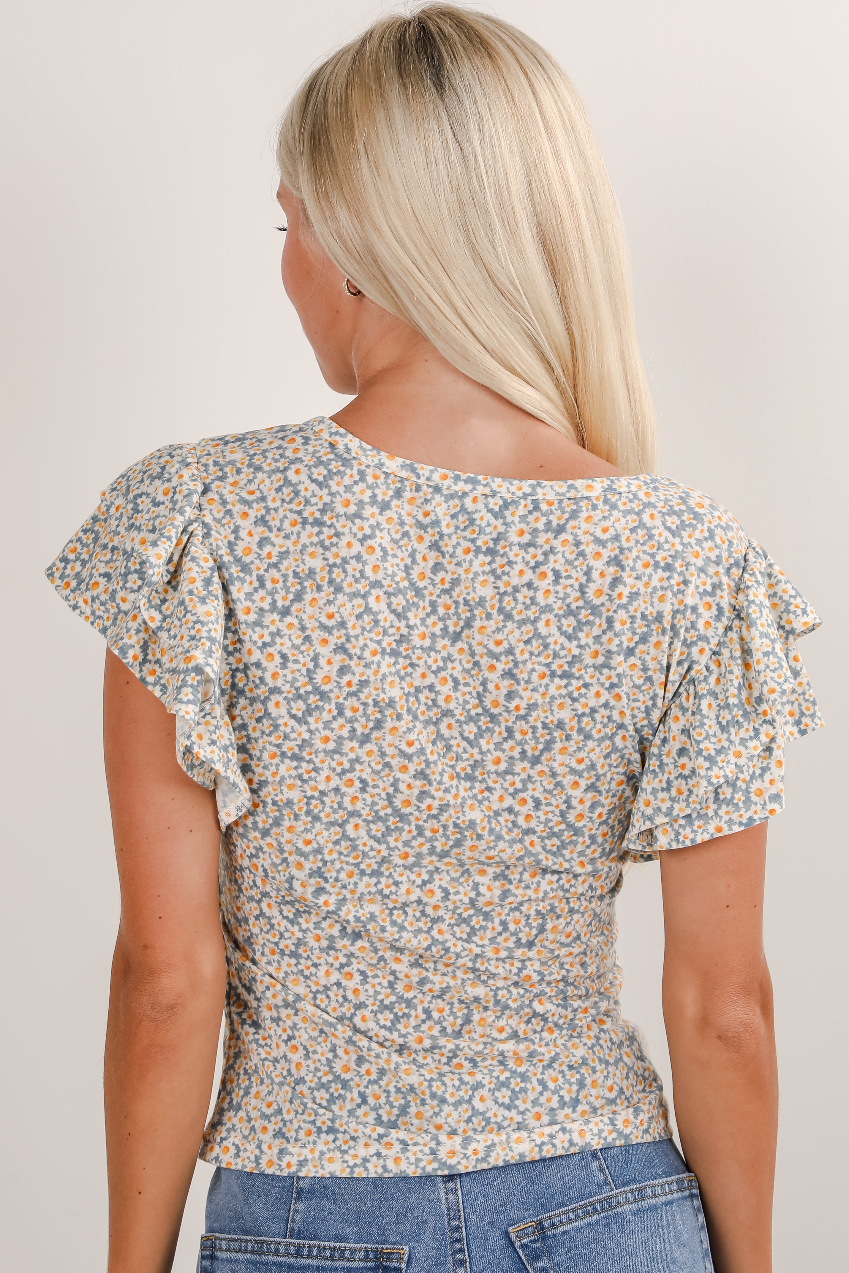 All The Fun Blue Floral Ruffle Top
