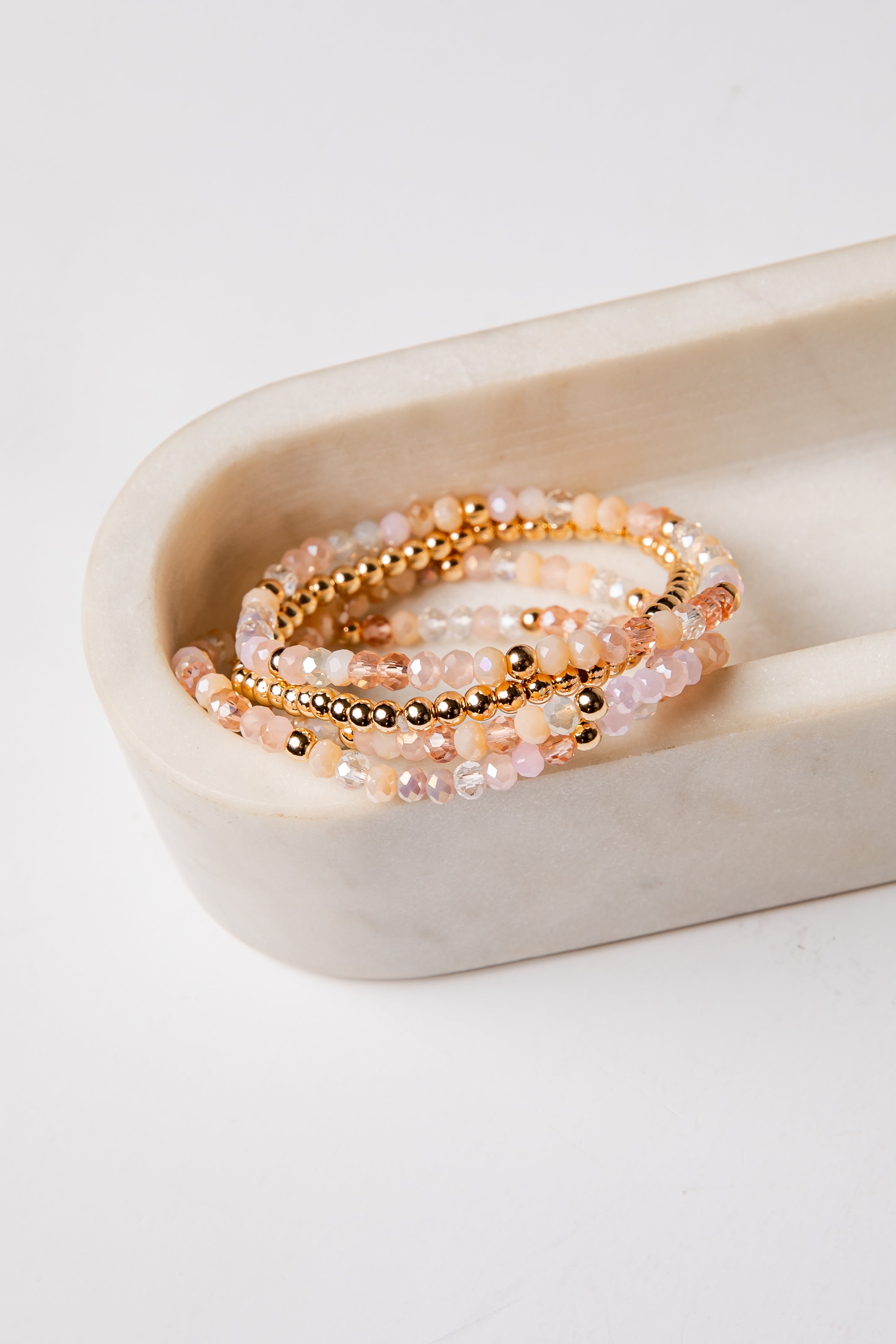 set of 4 gold and colorful beaded bracelets