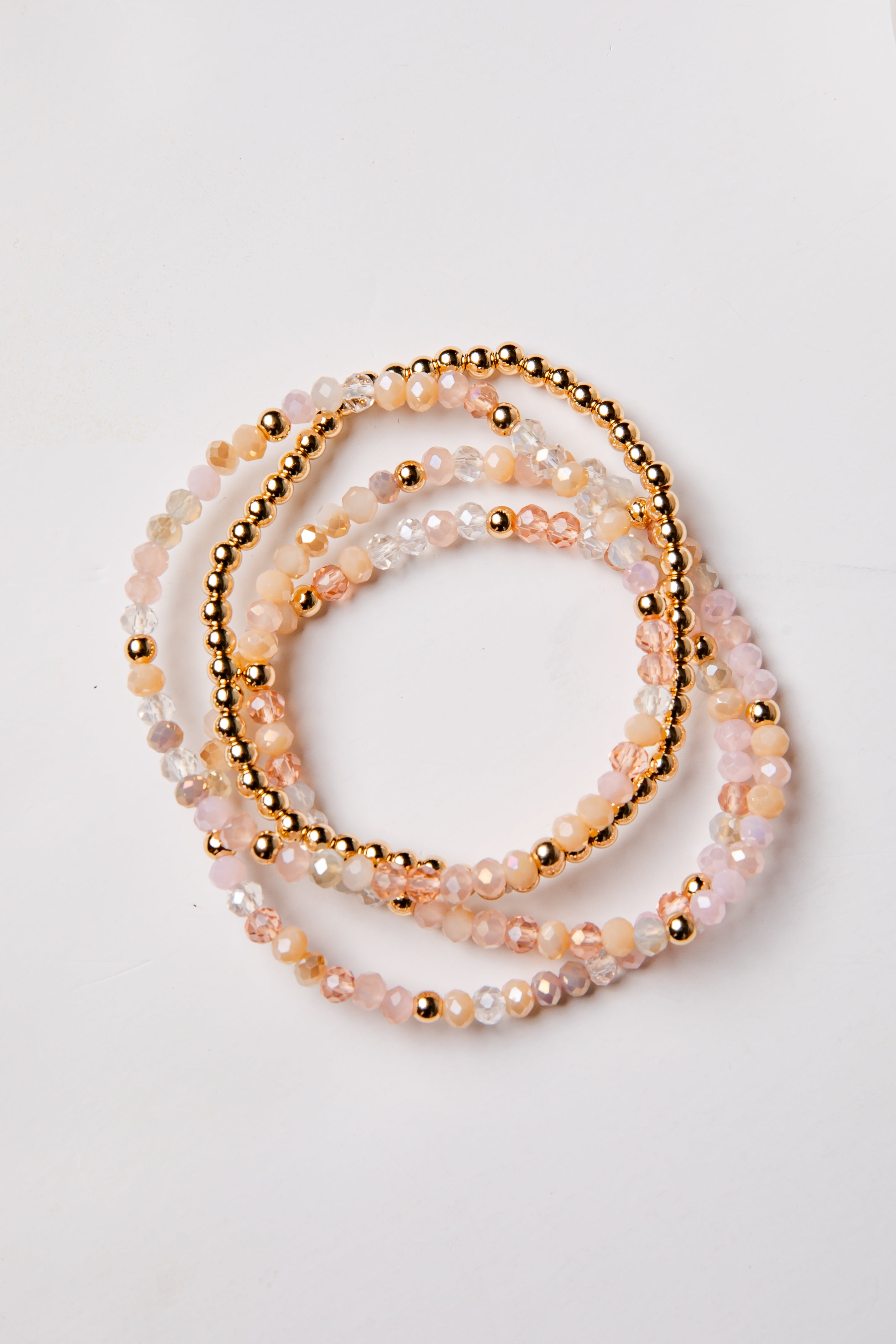 set of 4 gold and colorful beaded bracelets