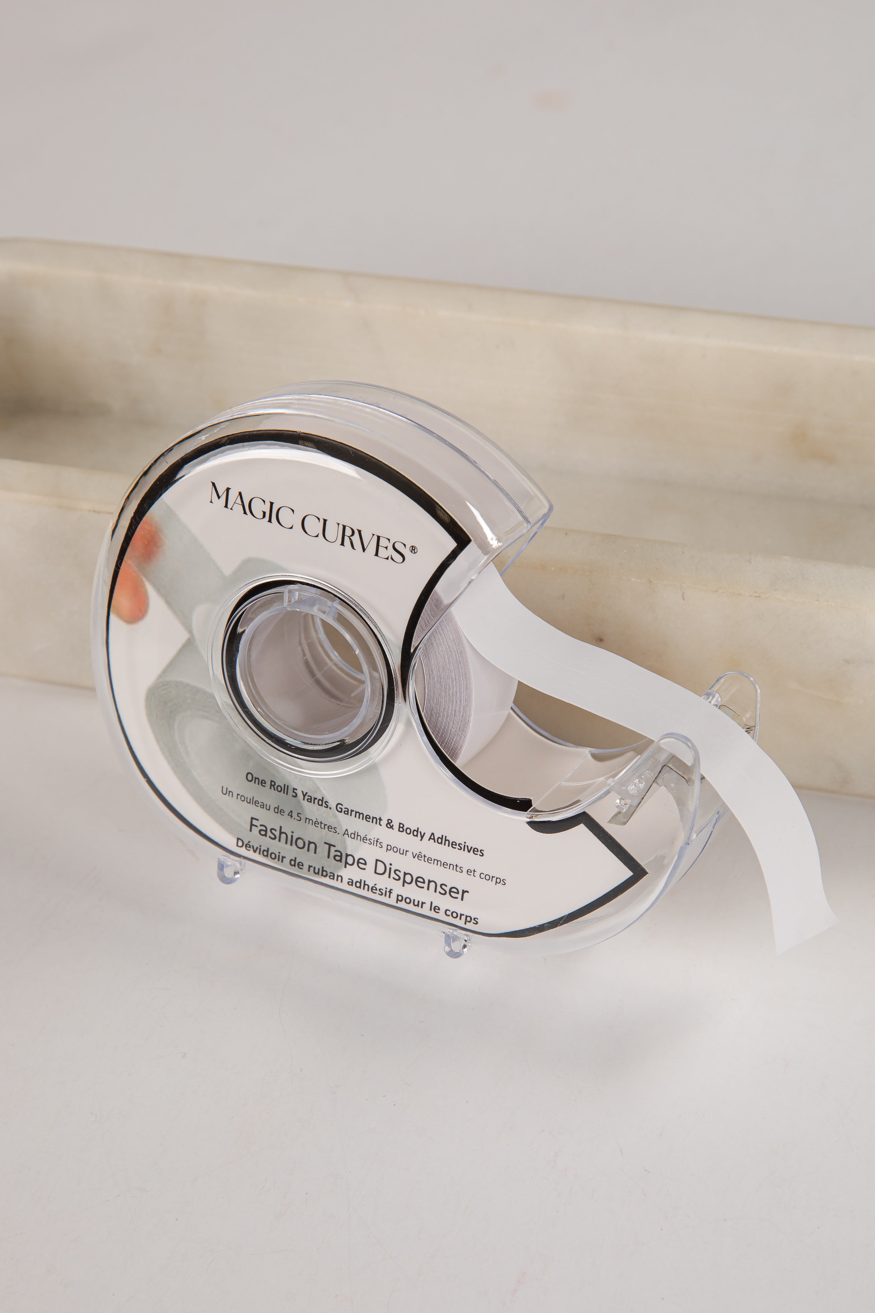 MAGIC CURVES tape dispenser on a white background