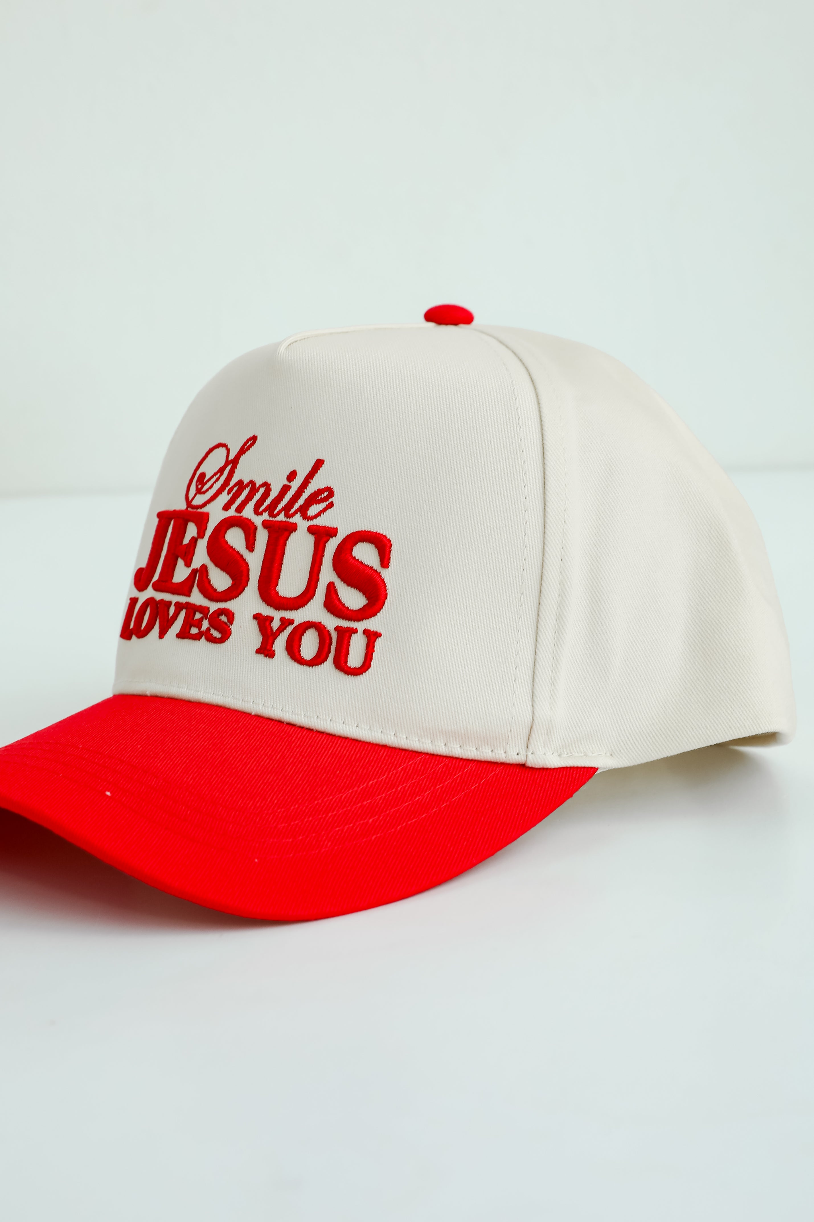 Red Smile Jesus Loves You Hat