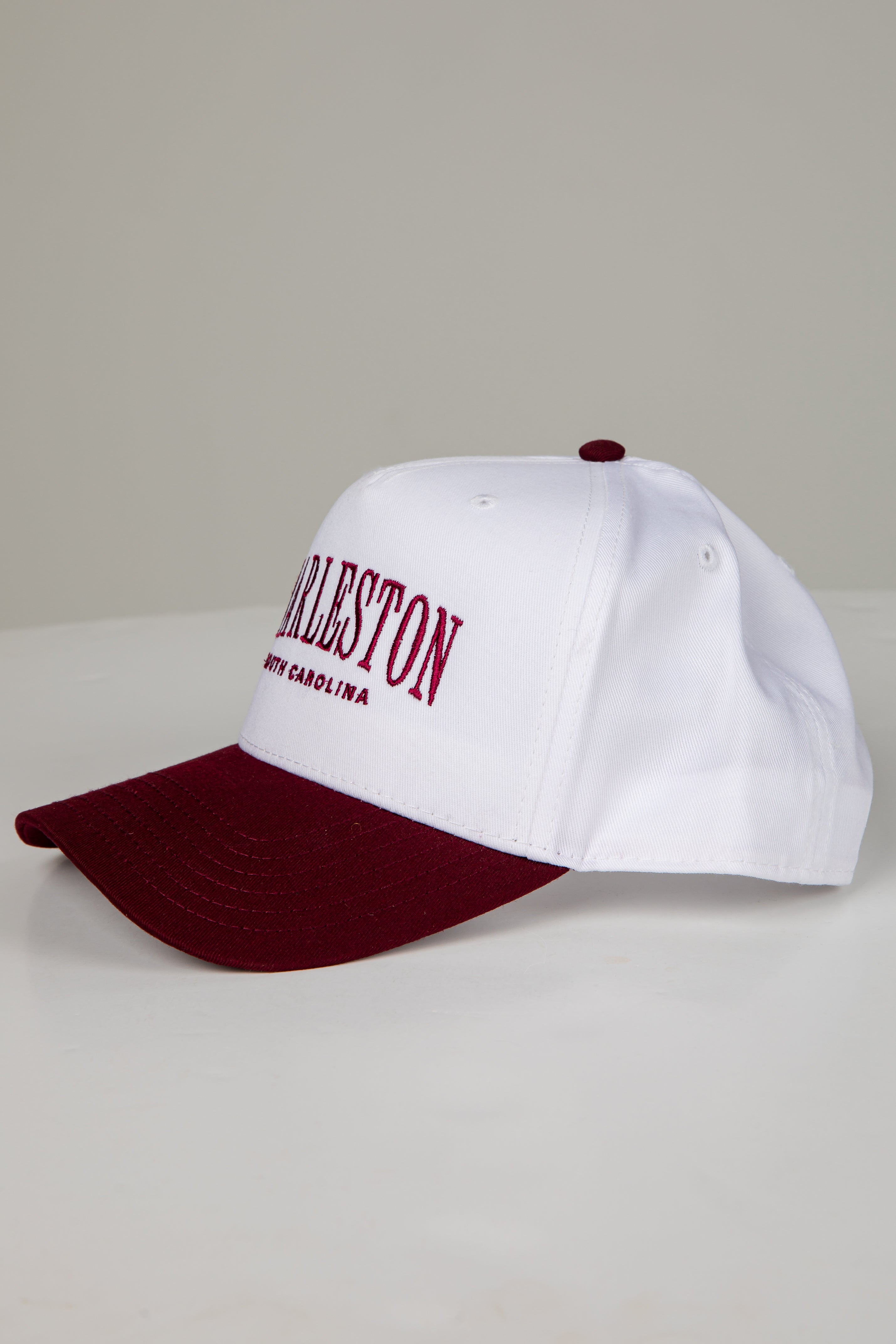 White and maroon cap with &