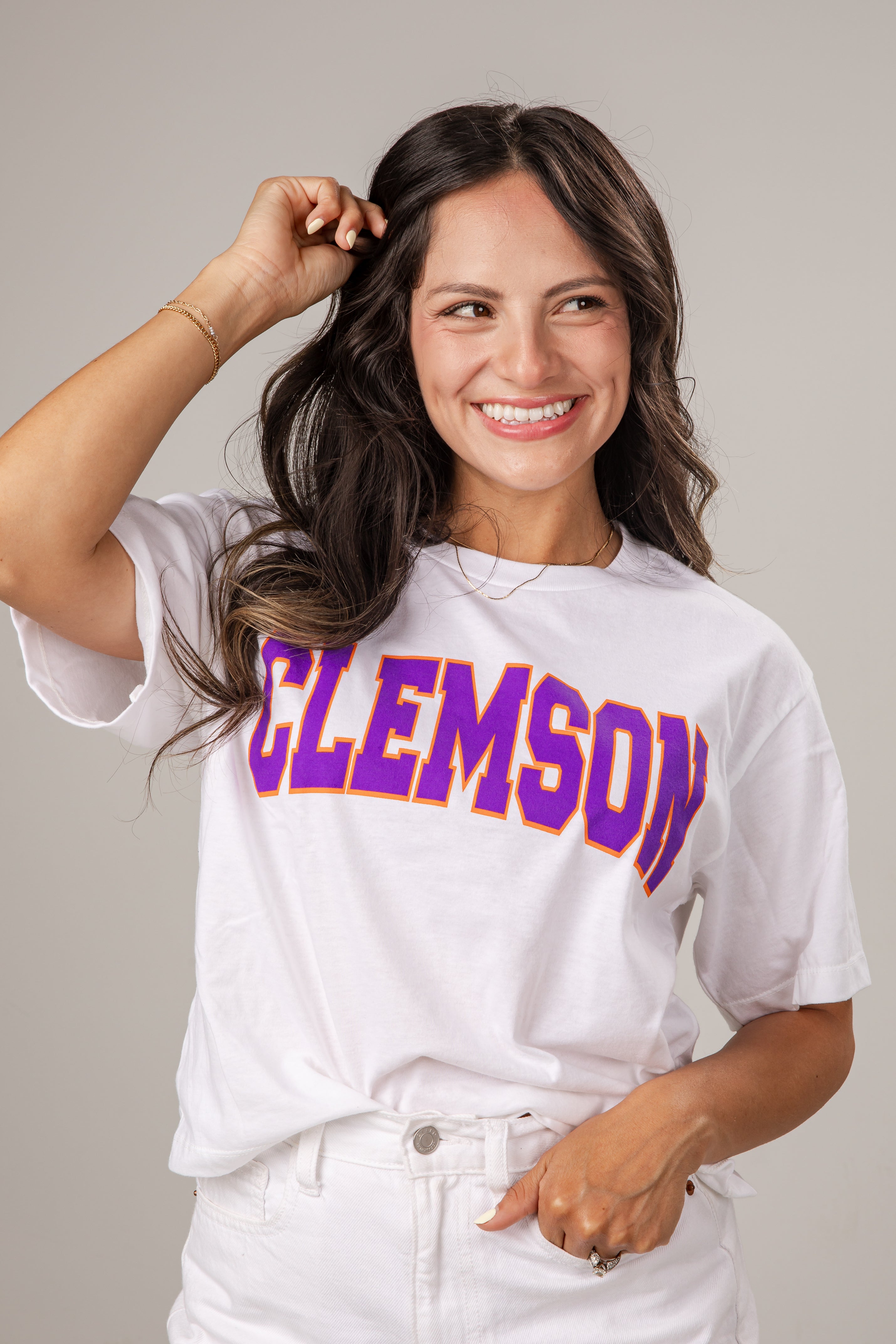 Woman wearing a white t-shirt with &