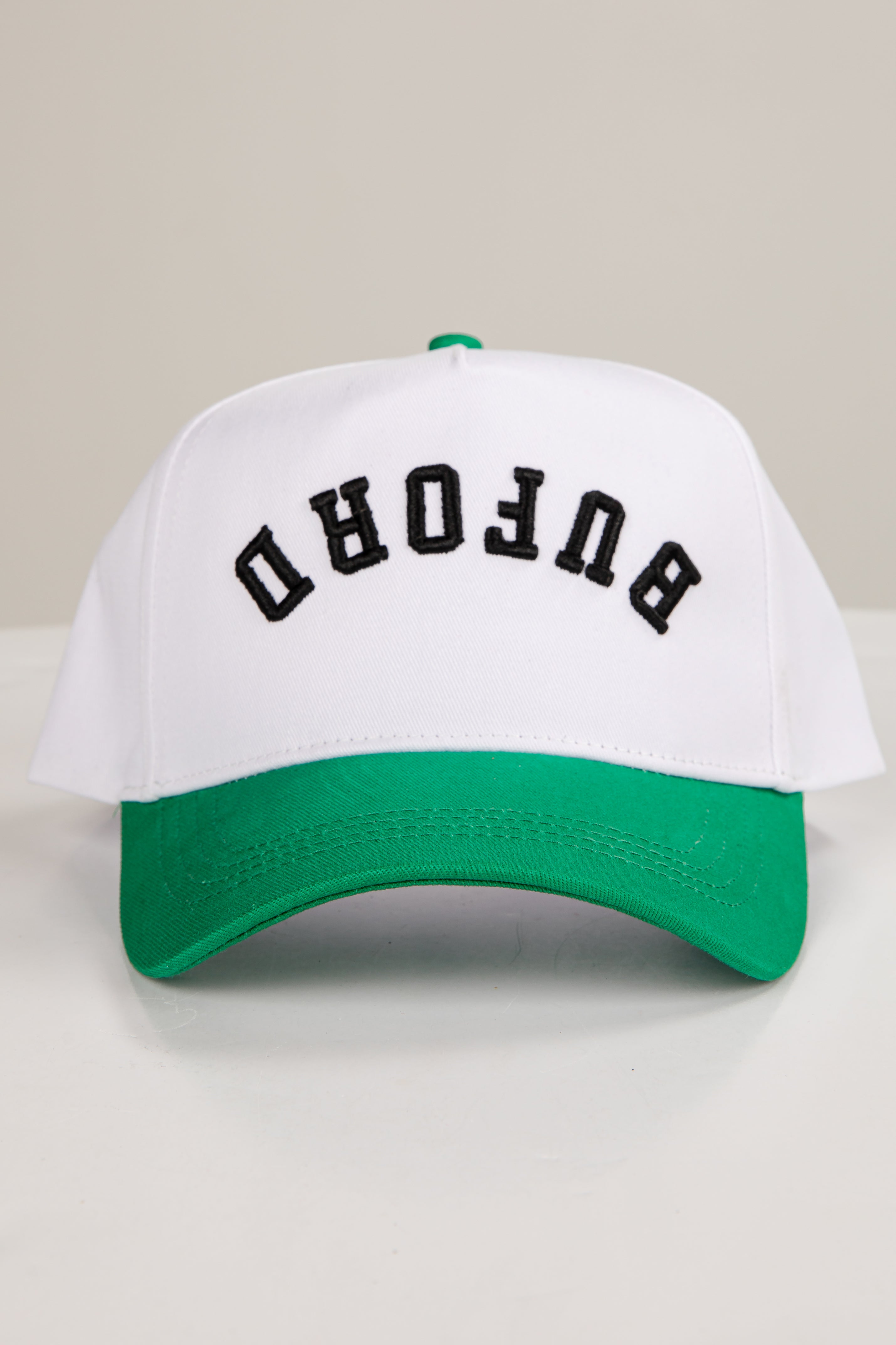 White and green cap with &