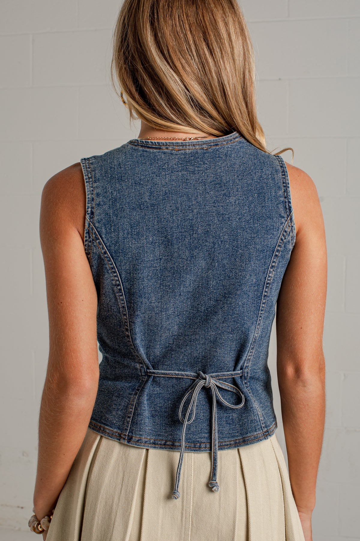 button front medium wash denim vest