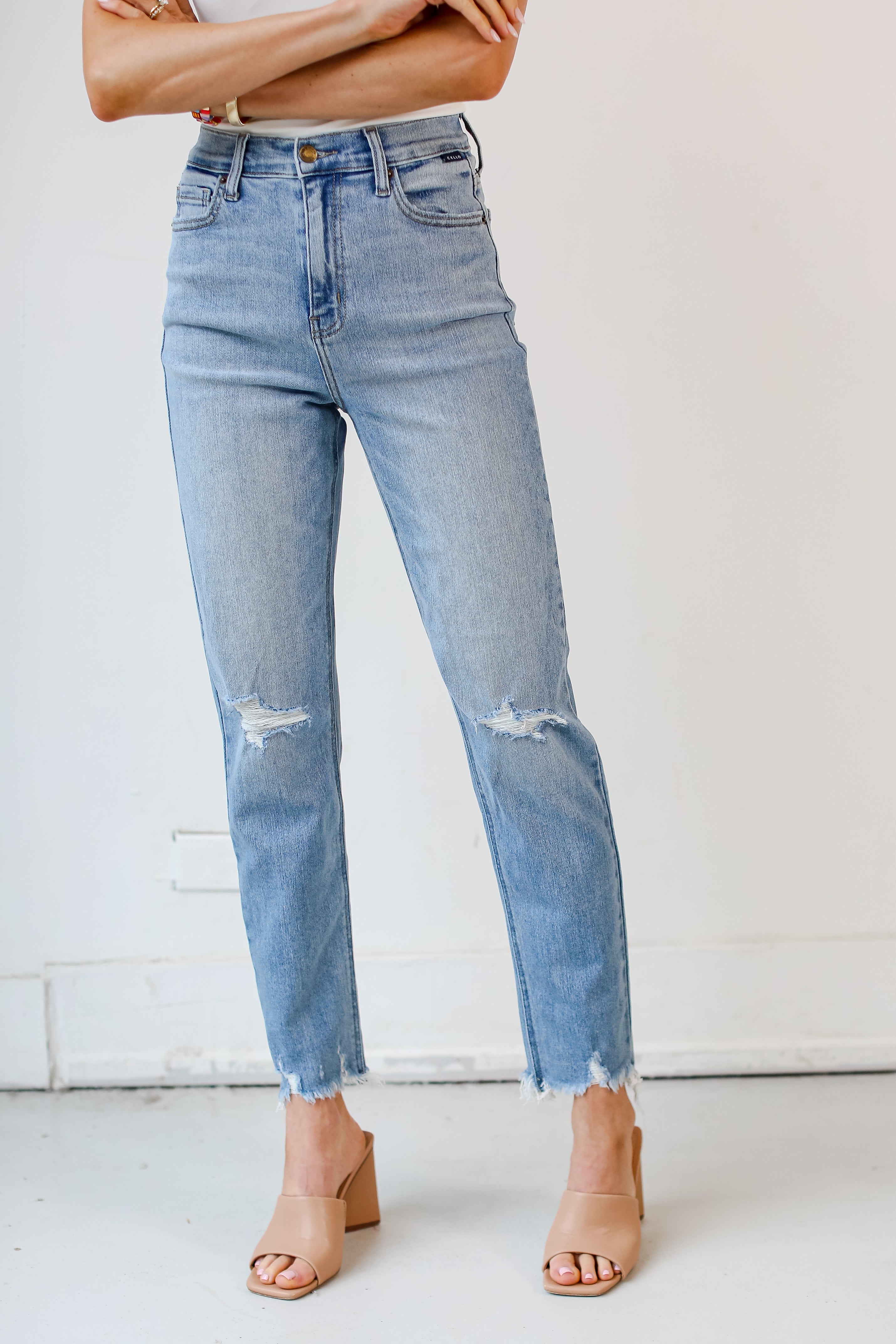 medium wash Distressed Mom Jeans close up