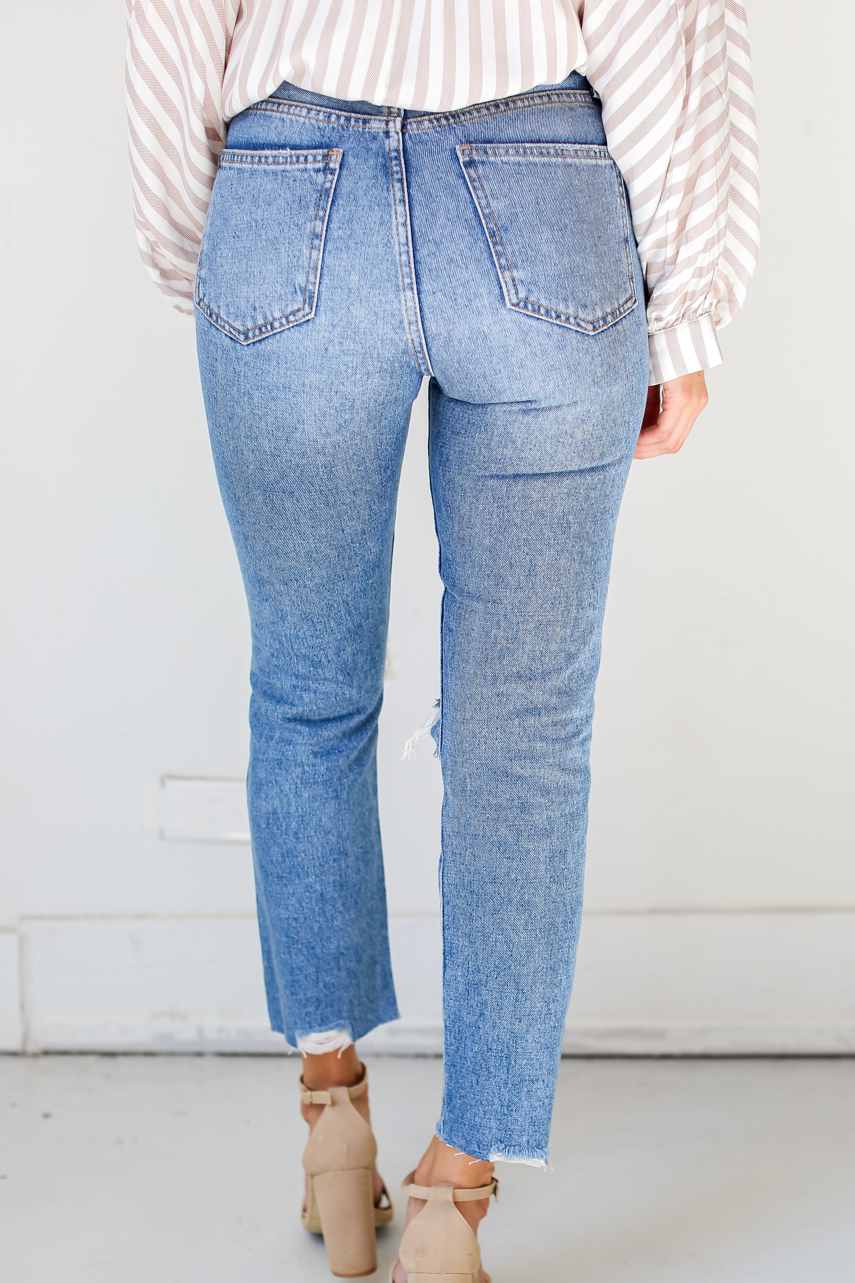 medium wash Distressed Mom Jeans back view