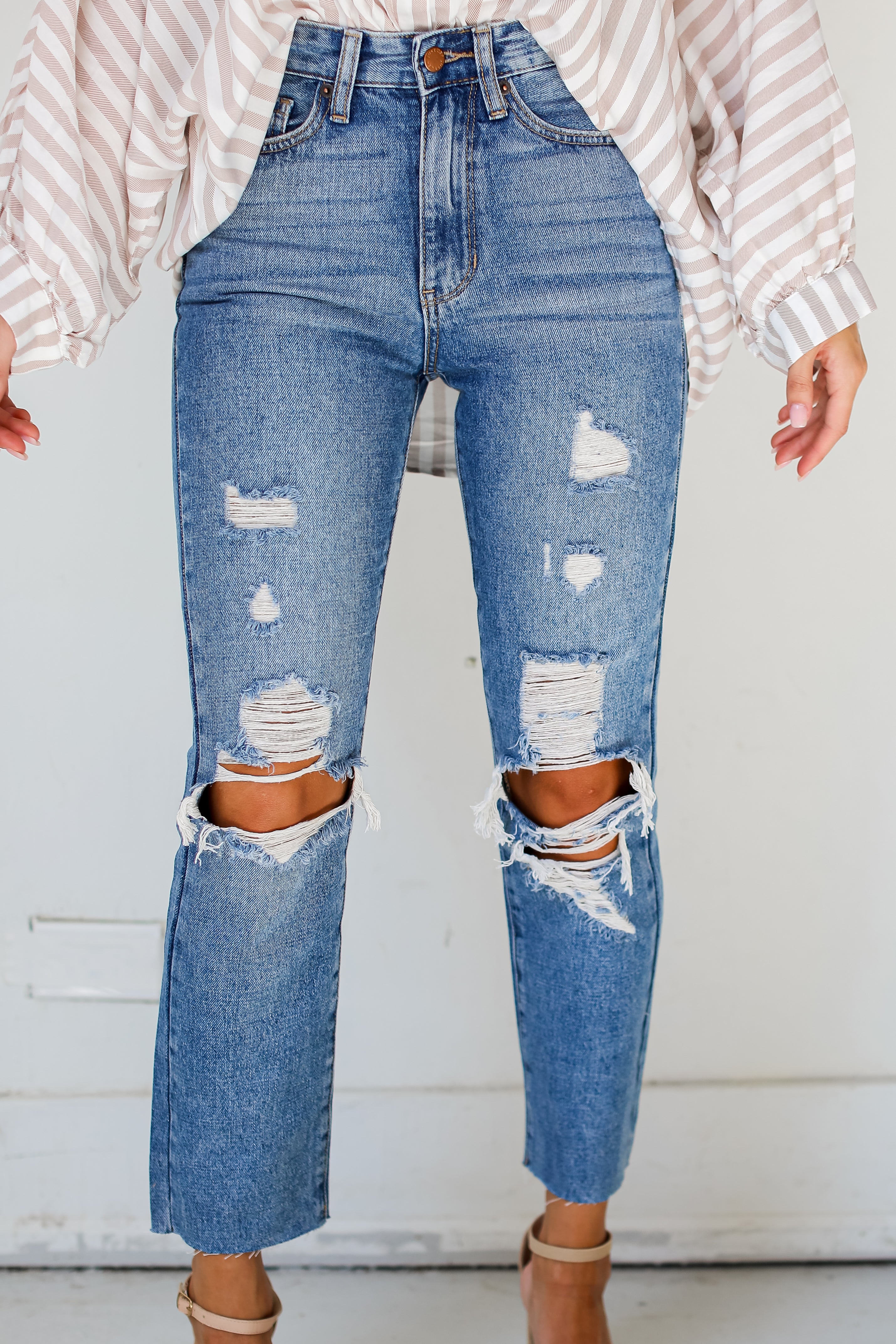 medium wash Distressed Mom Jeans close up