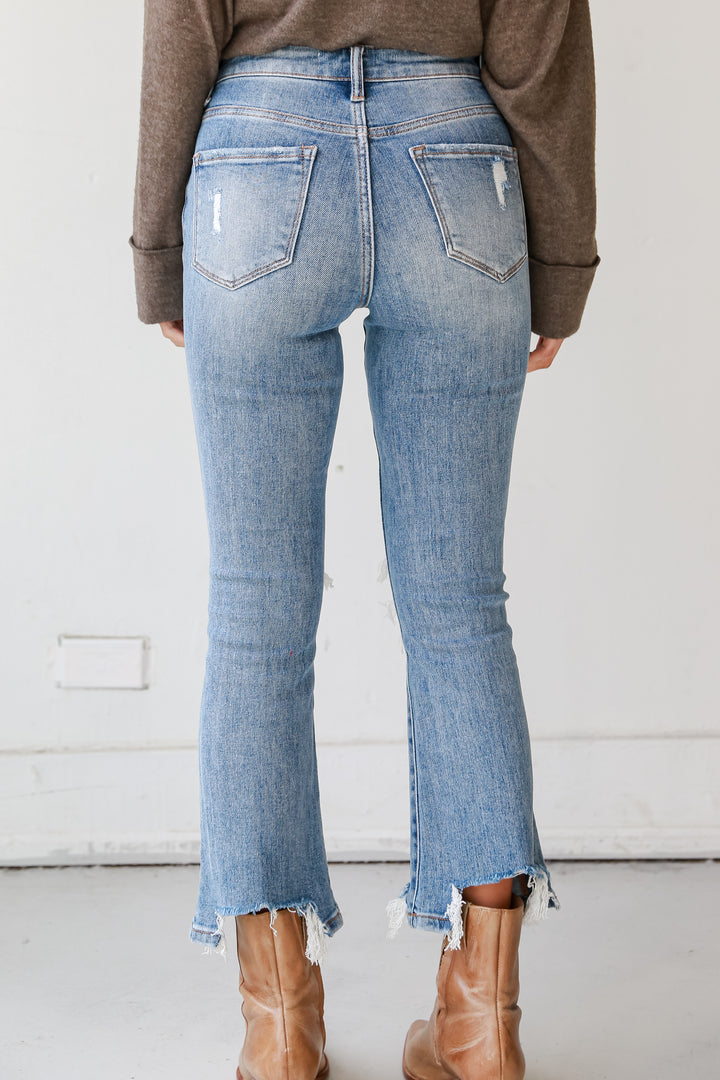 Light Wash Distressed Kick Flare Jeans Plus on model