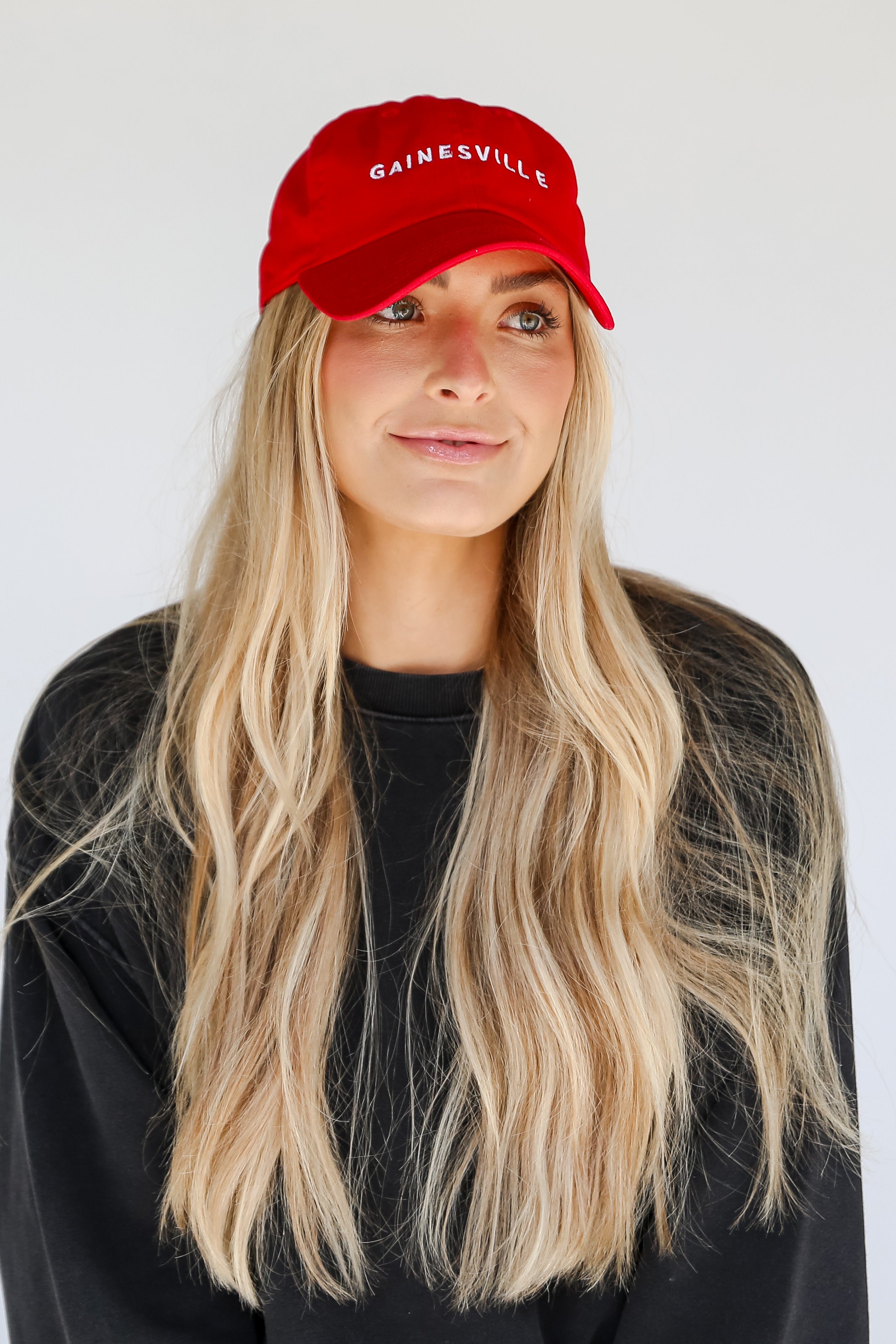 red Gainesville Embroidered Hat on model