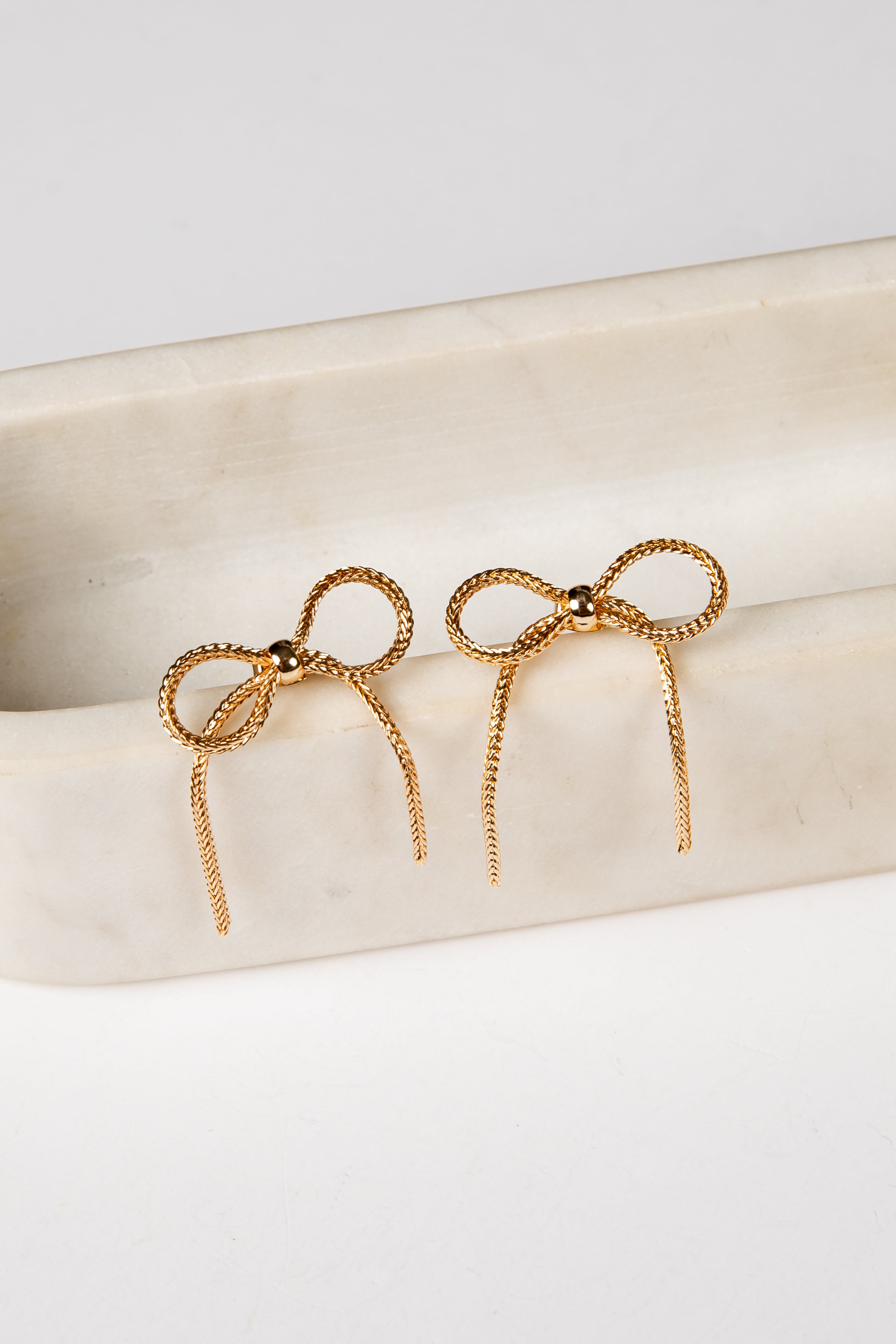 gold bow earrings