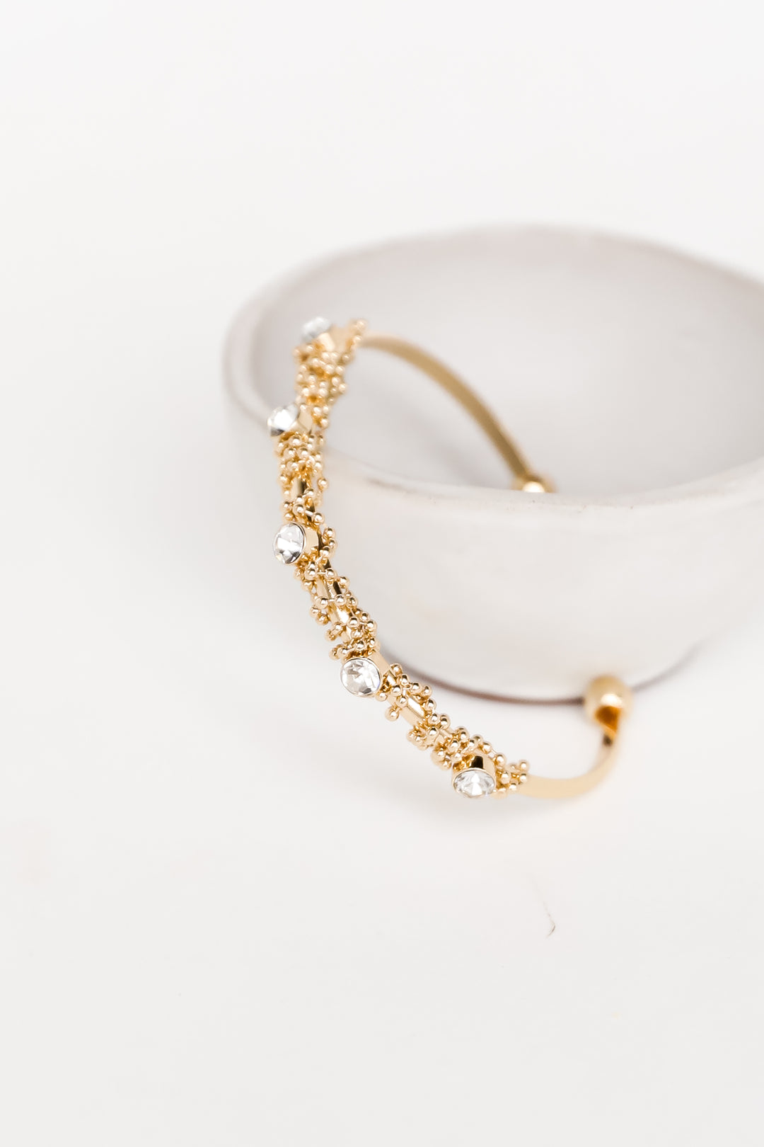 Gold Rhinestone Cuff Bracelet flat lay