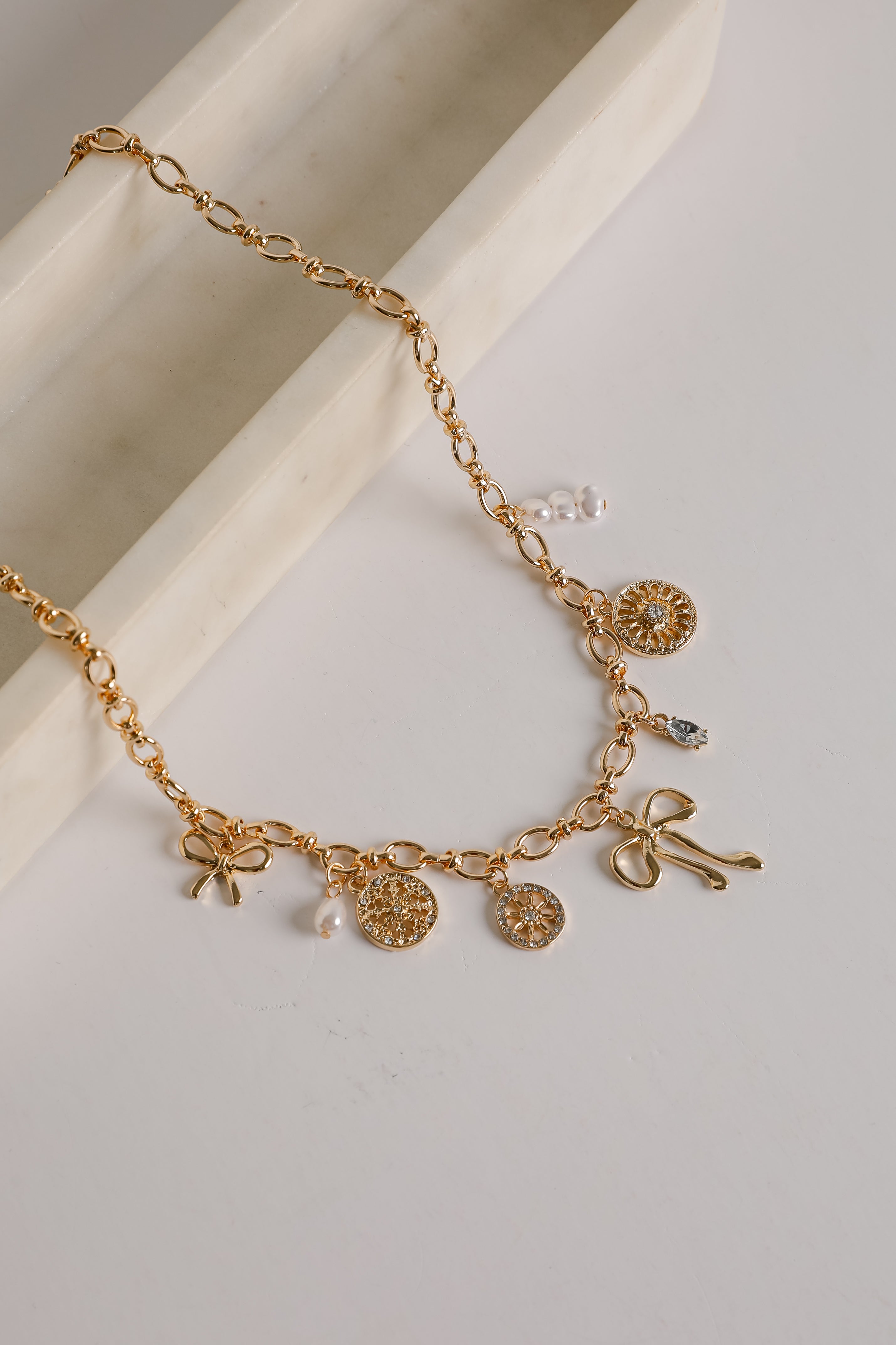 Meredith Gold Bow Charm Necklace