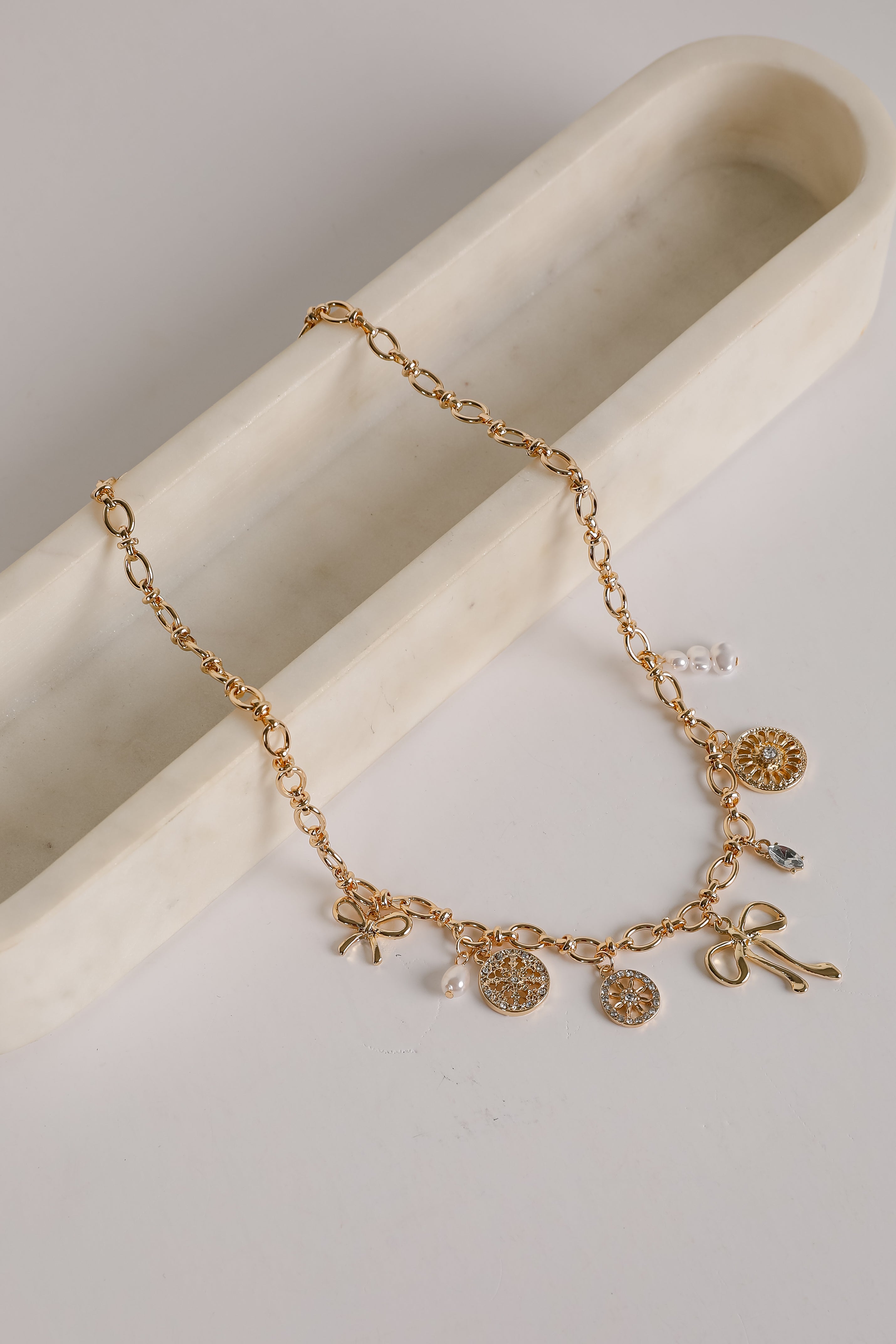 Meredith Gold Bow Charm Necklace