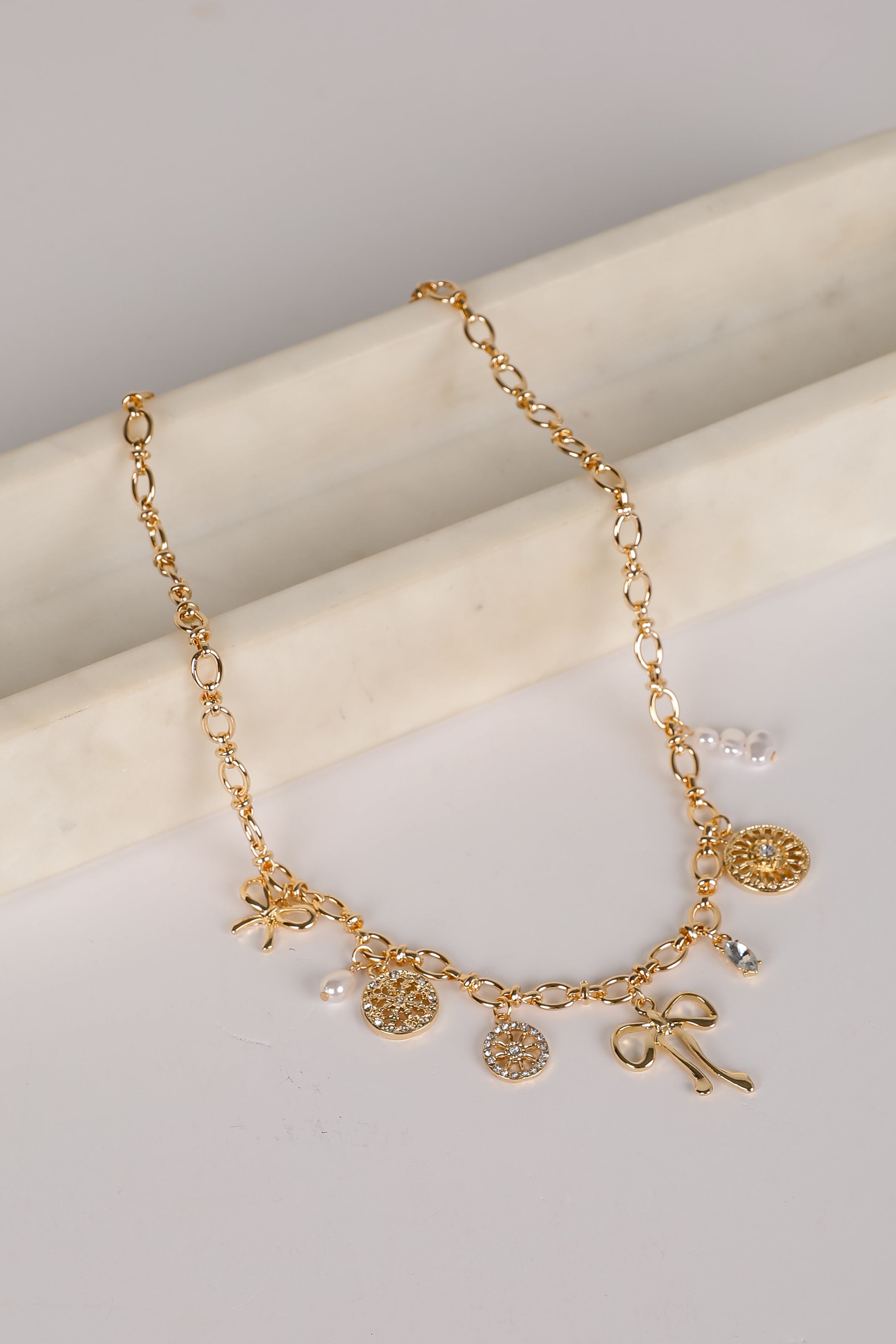 Meredith Gold Bow Charm Necklace