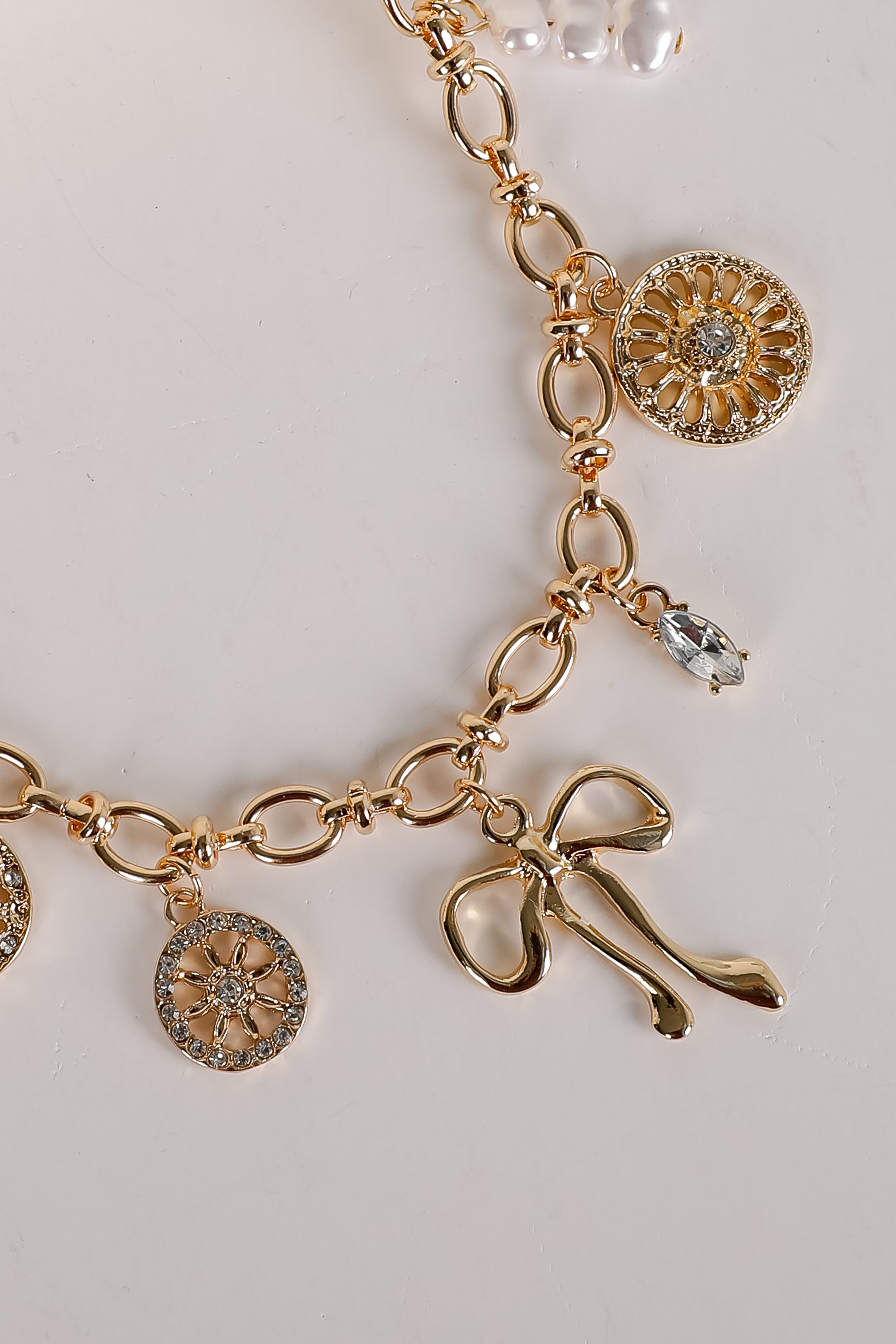 Meredith Gold Bow Charm Necklace