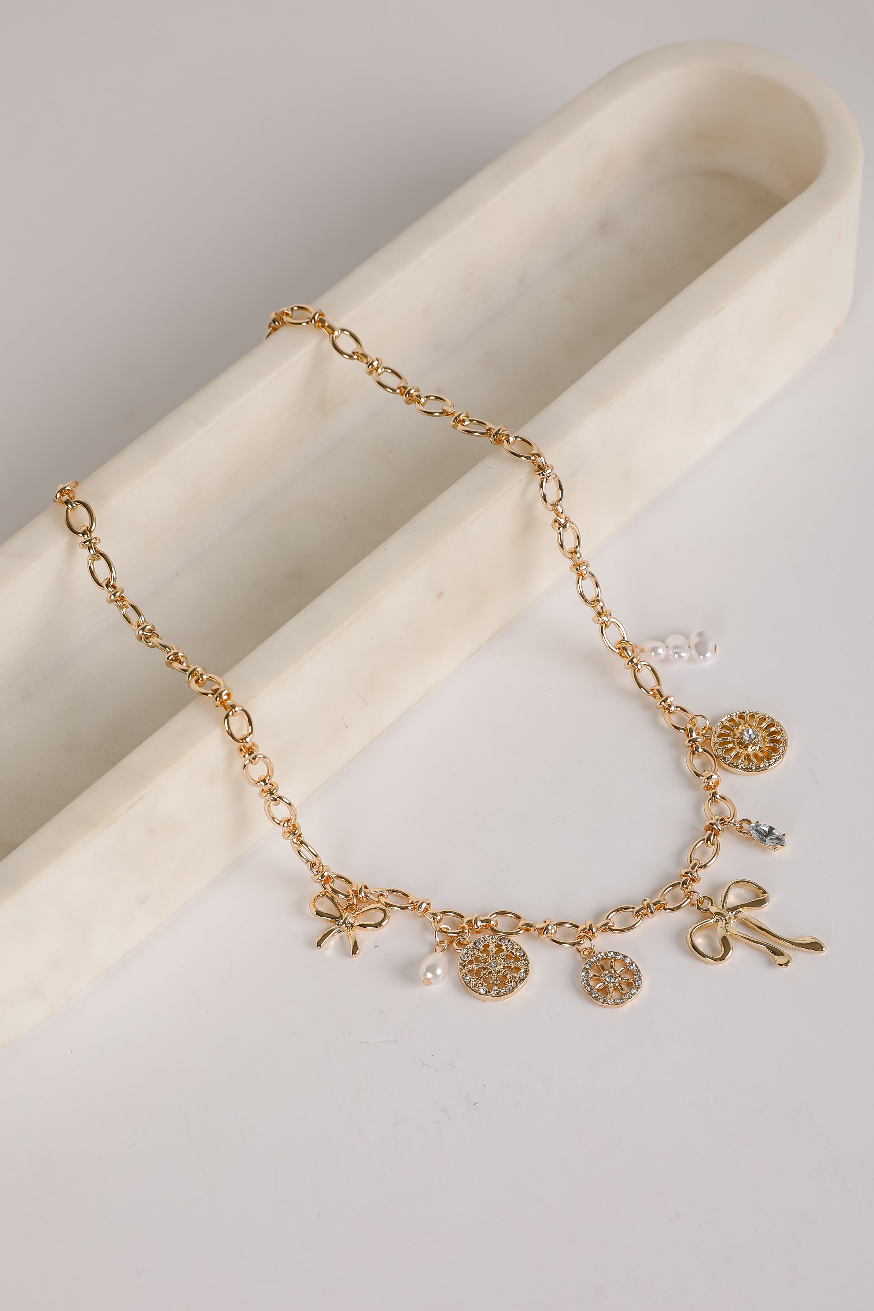 Meredith Gold Bow Charm Necklace