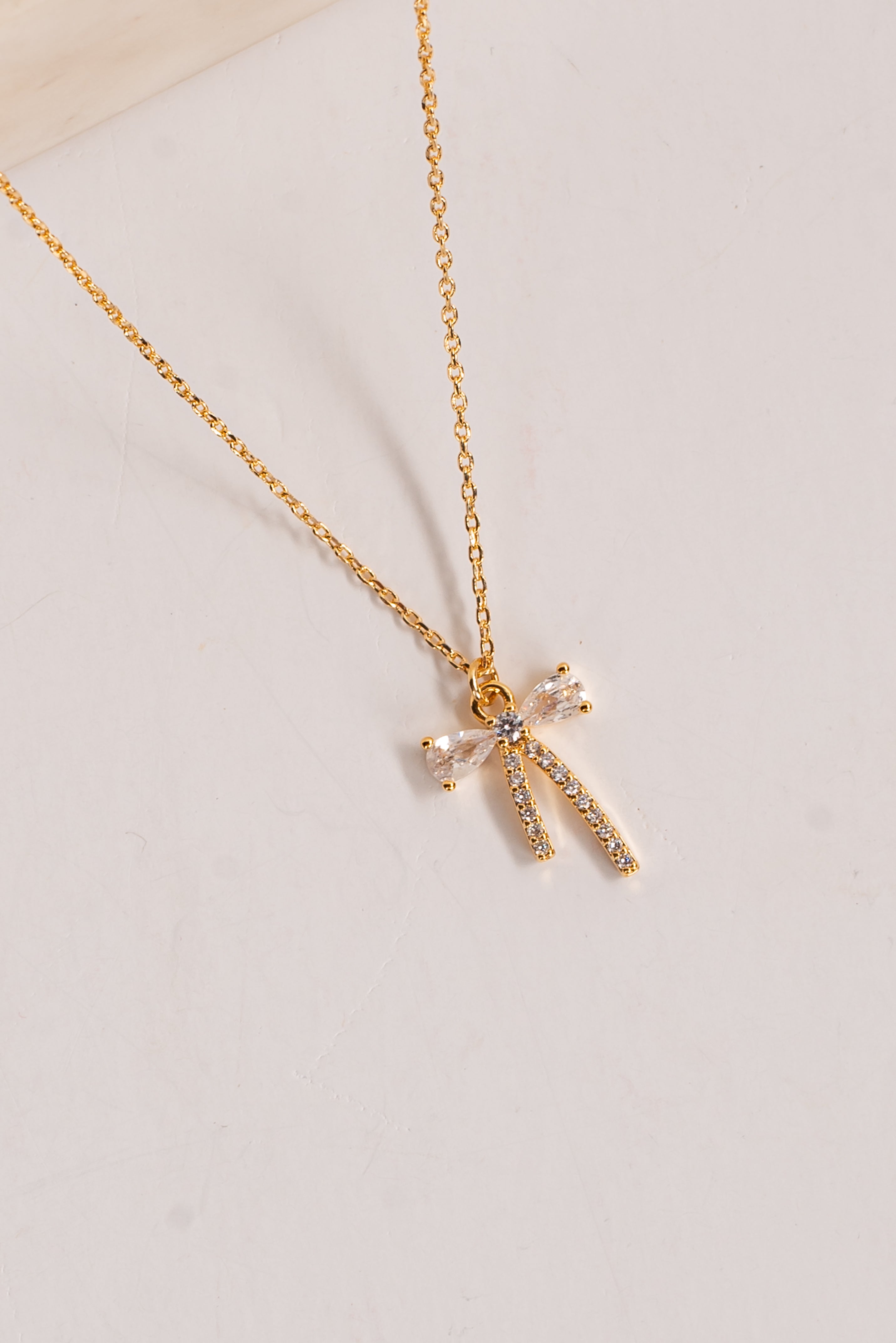 Charlie Gold Rhinestone Bow Charm Necklace