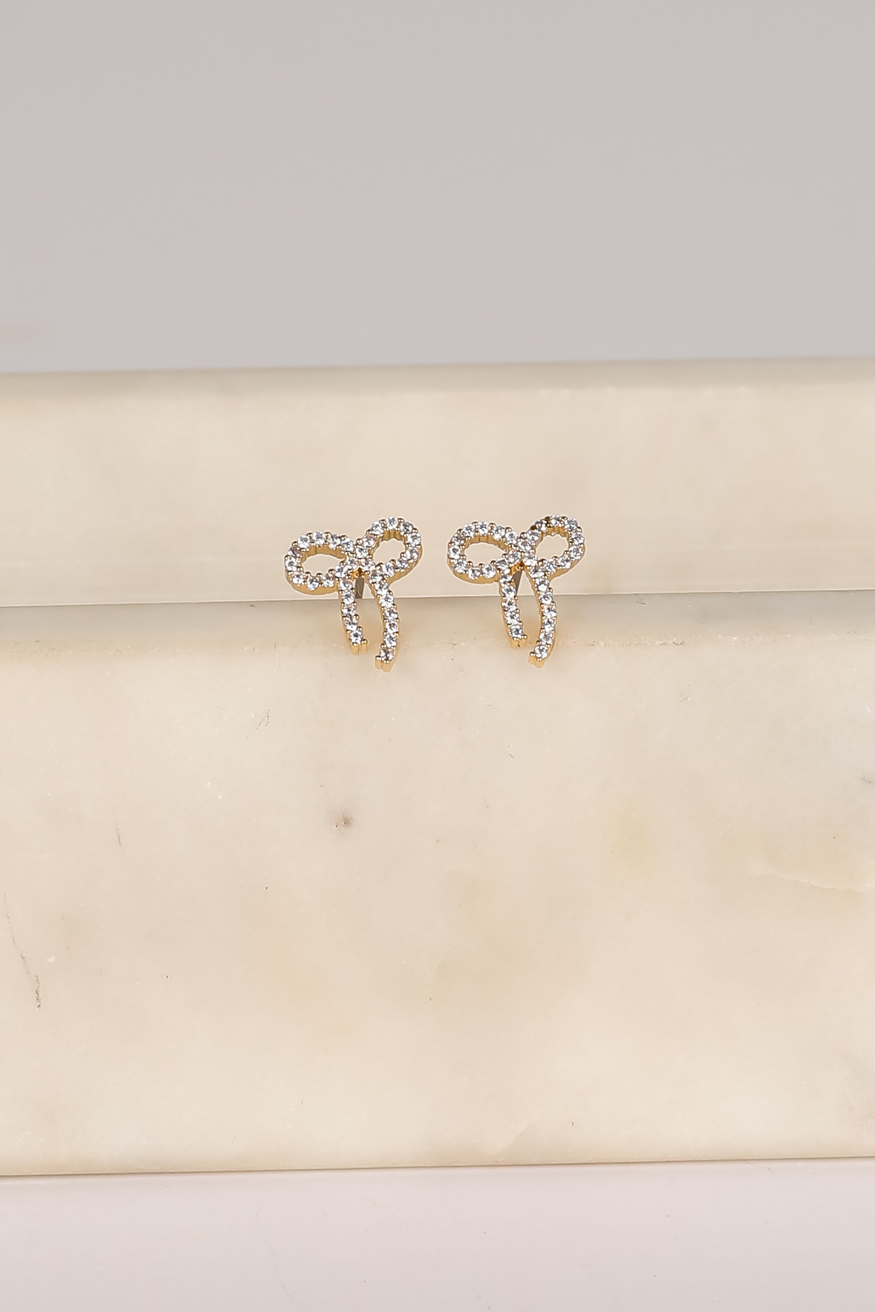 Daniella Gold Rhinestone Bow Earrings