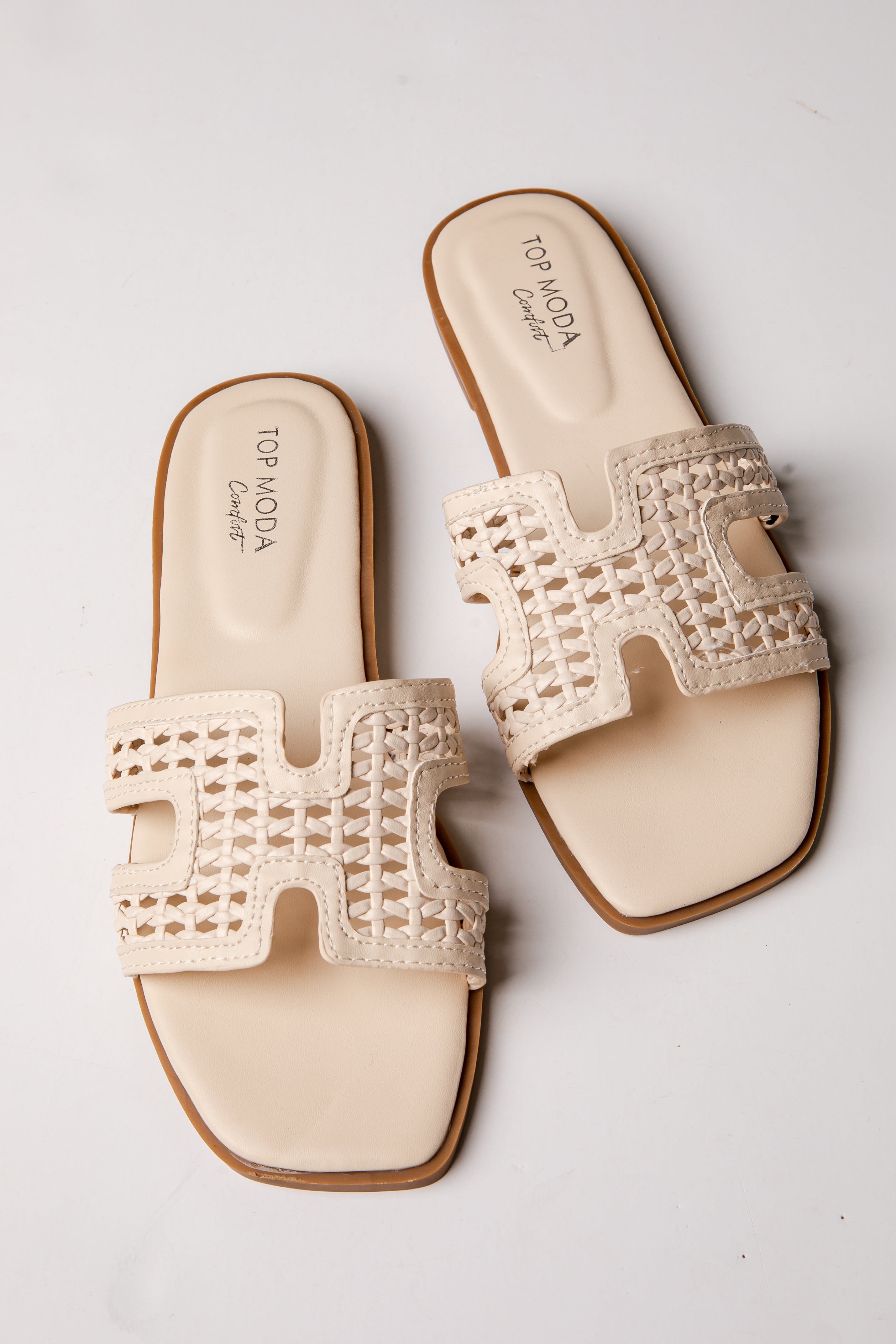 Pair of beige sandals with decorative &