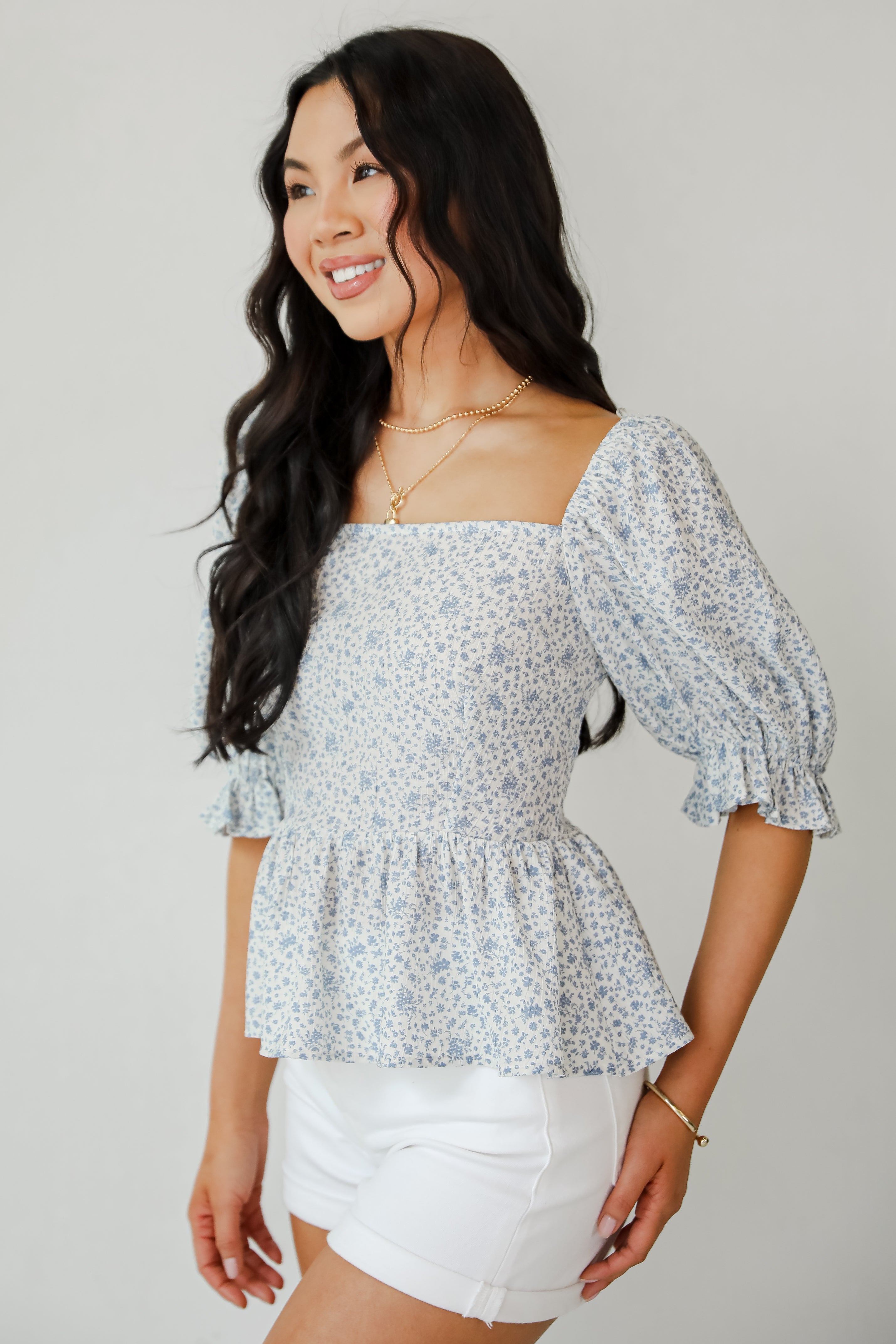 Typical Cutie Ivory Floral Peplum Blouse