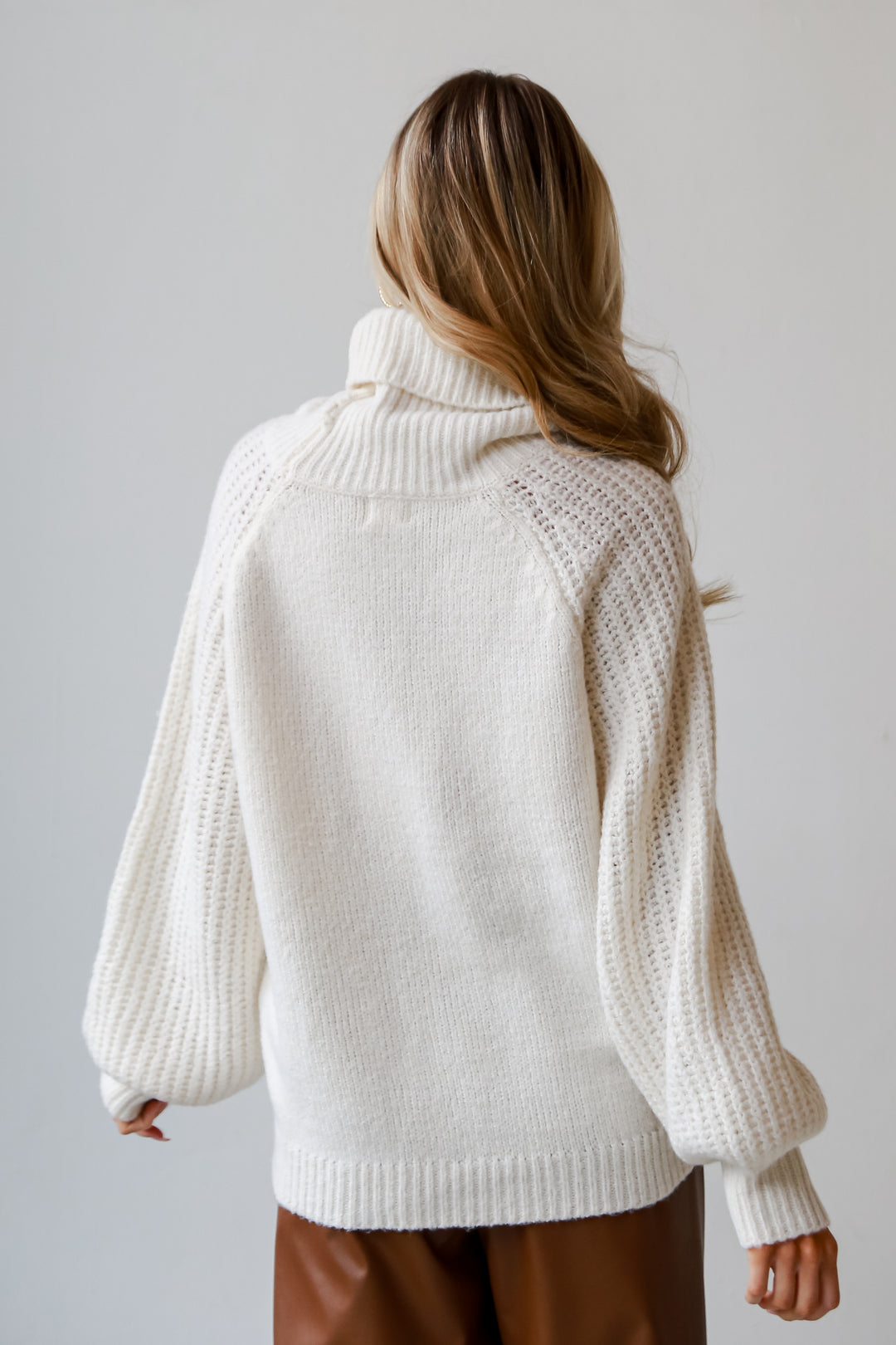 Ivory Turtleneck Oversized Sweater back view