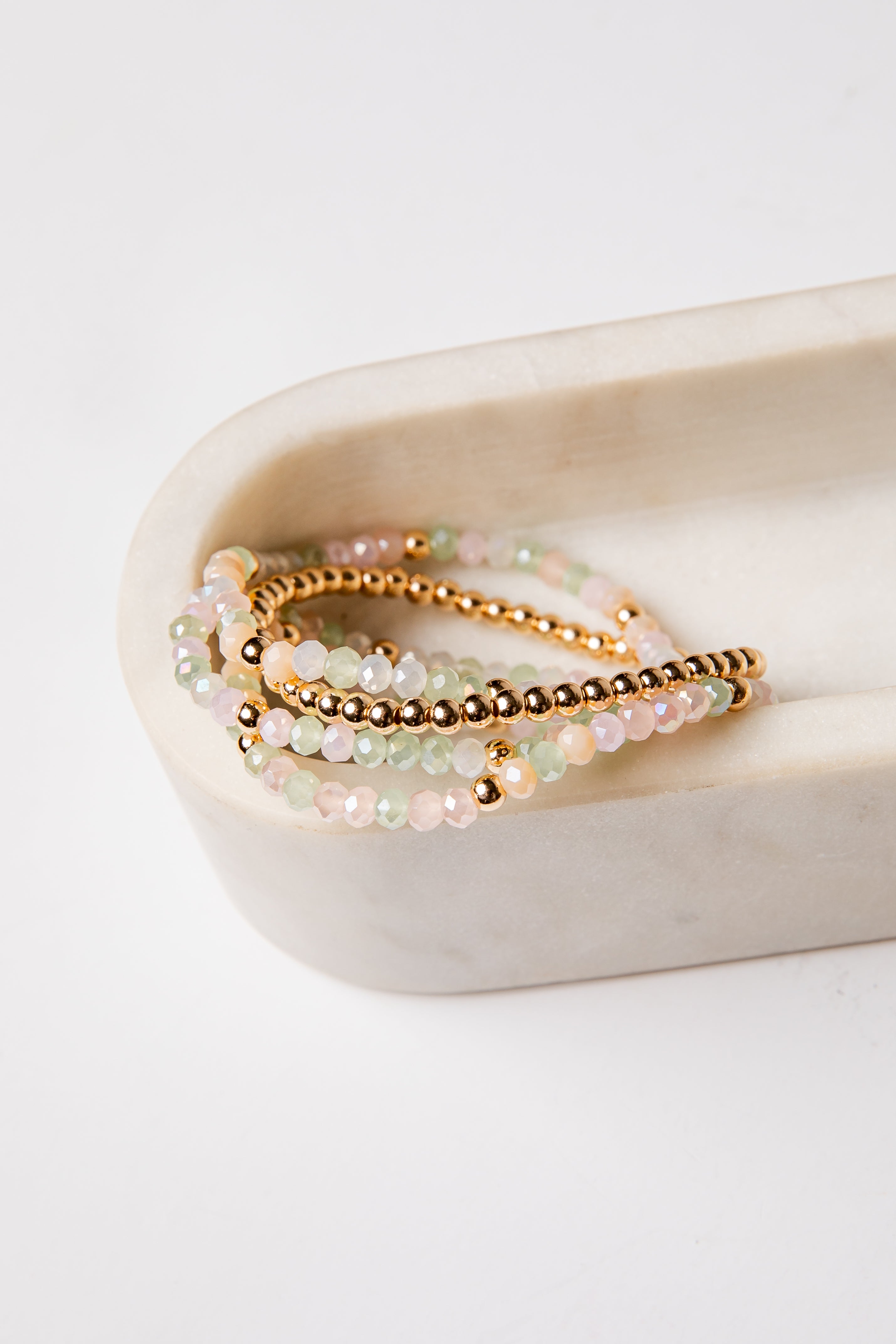 set of 4 gold and colorful beaded bracelets