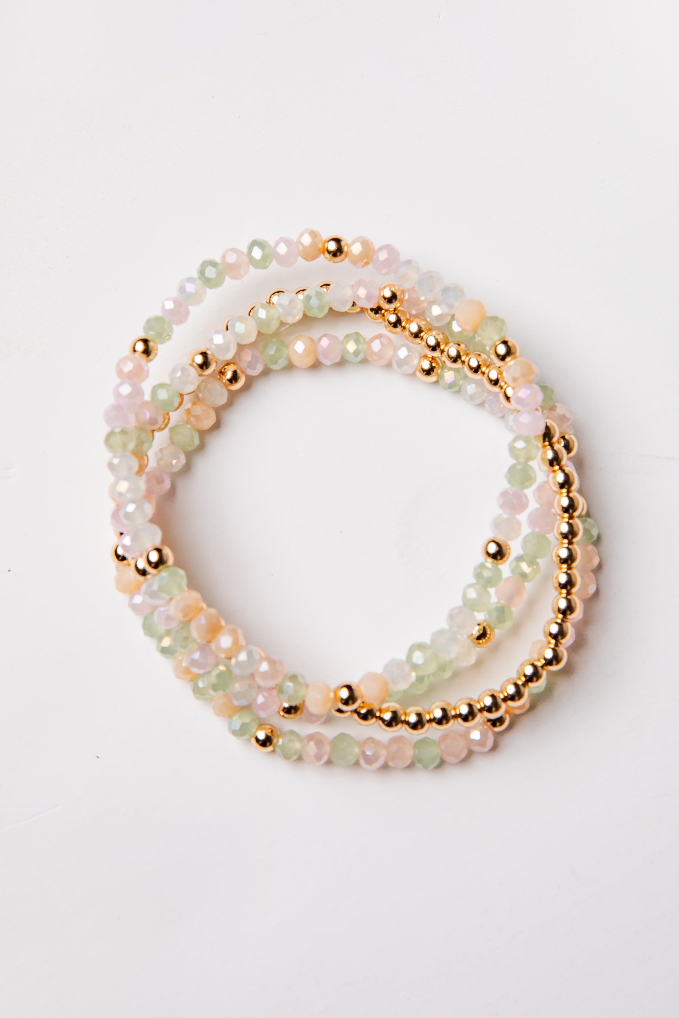 set of 4 gold and colorful beaded bracelets