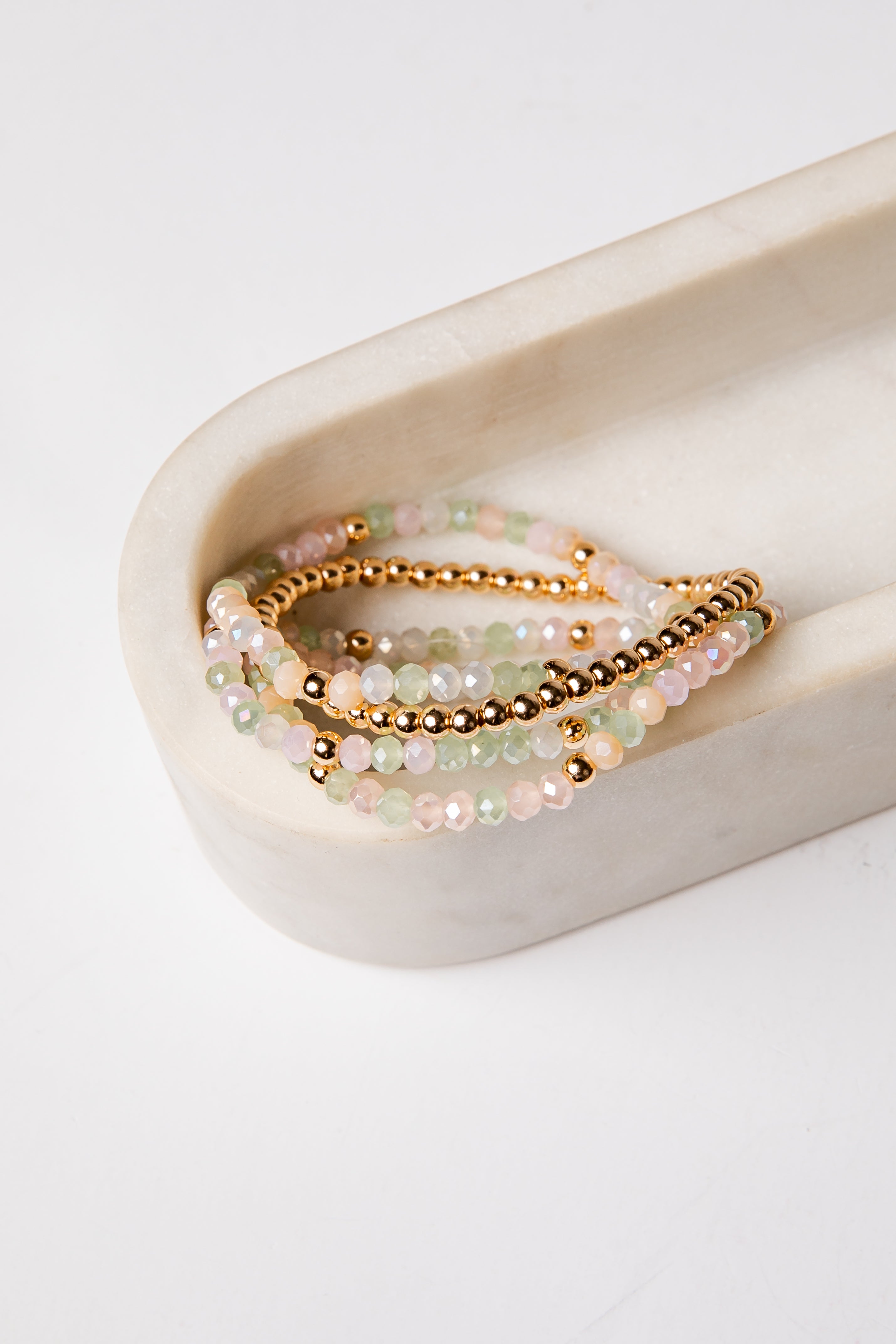 set of 4 gold and colorful beaded bracelets