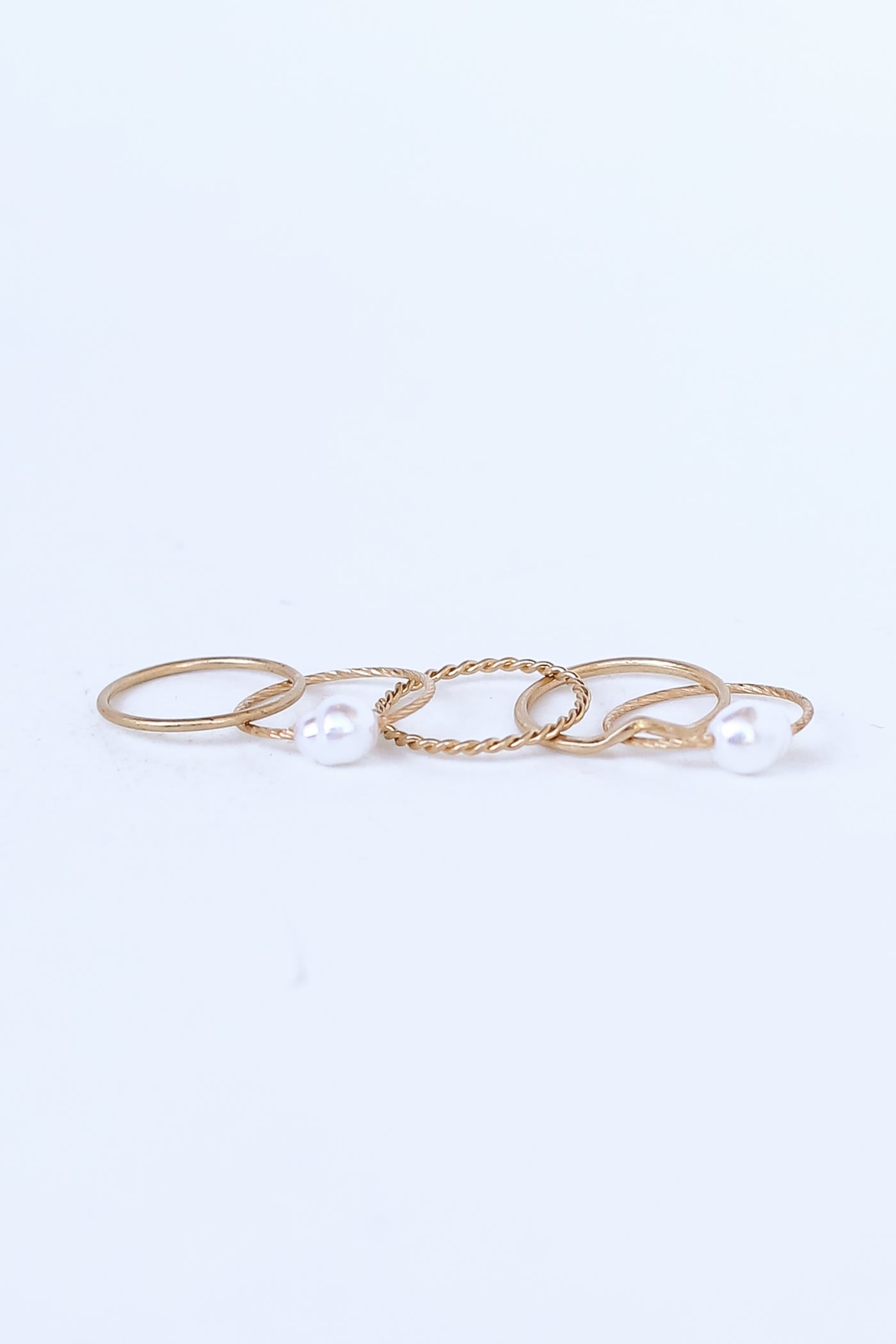 Gold Pearl Ring Set flat lay