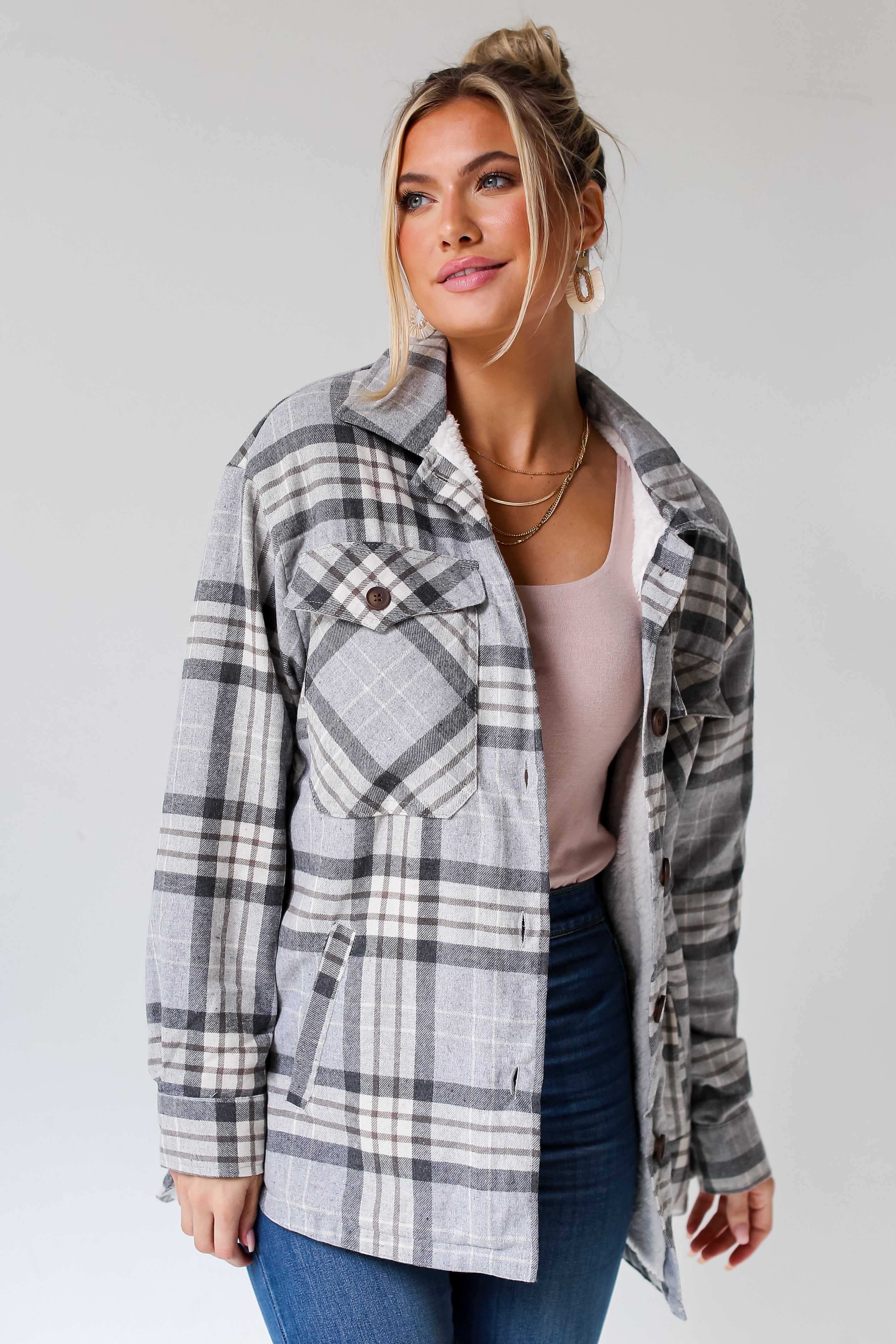 model wearing a Grey Plaid Sherpa Shacket