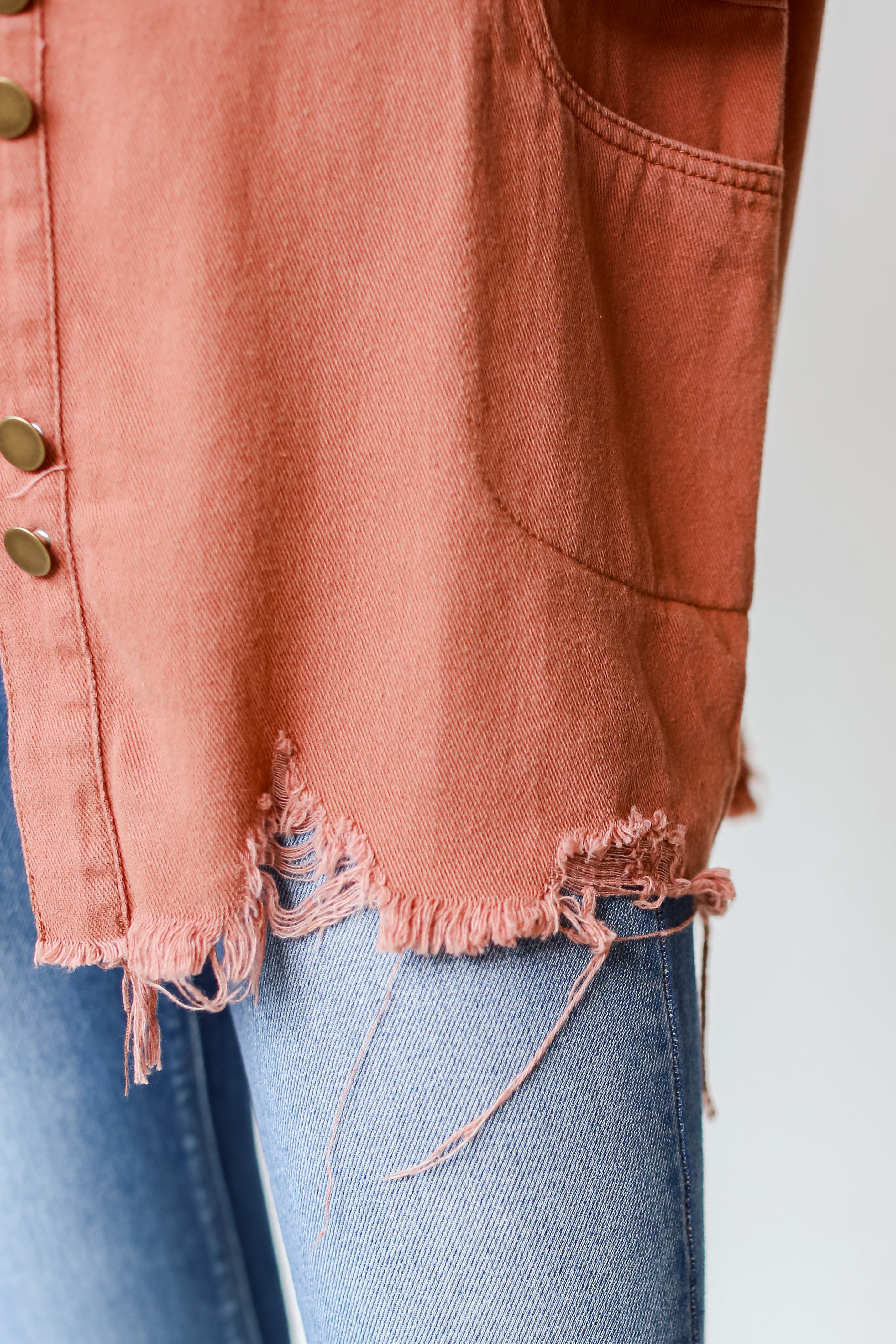 rust Distressed Denim Jacket close up view