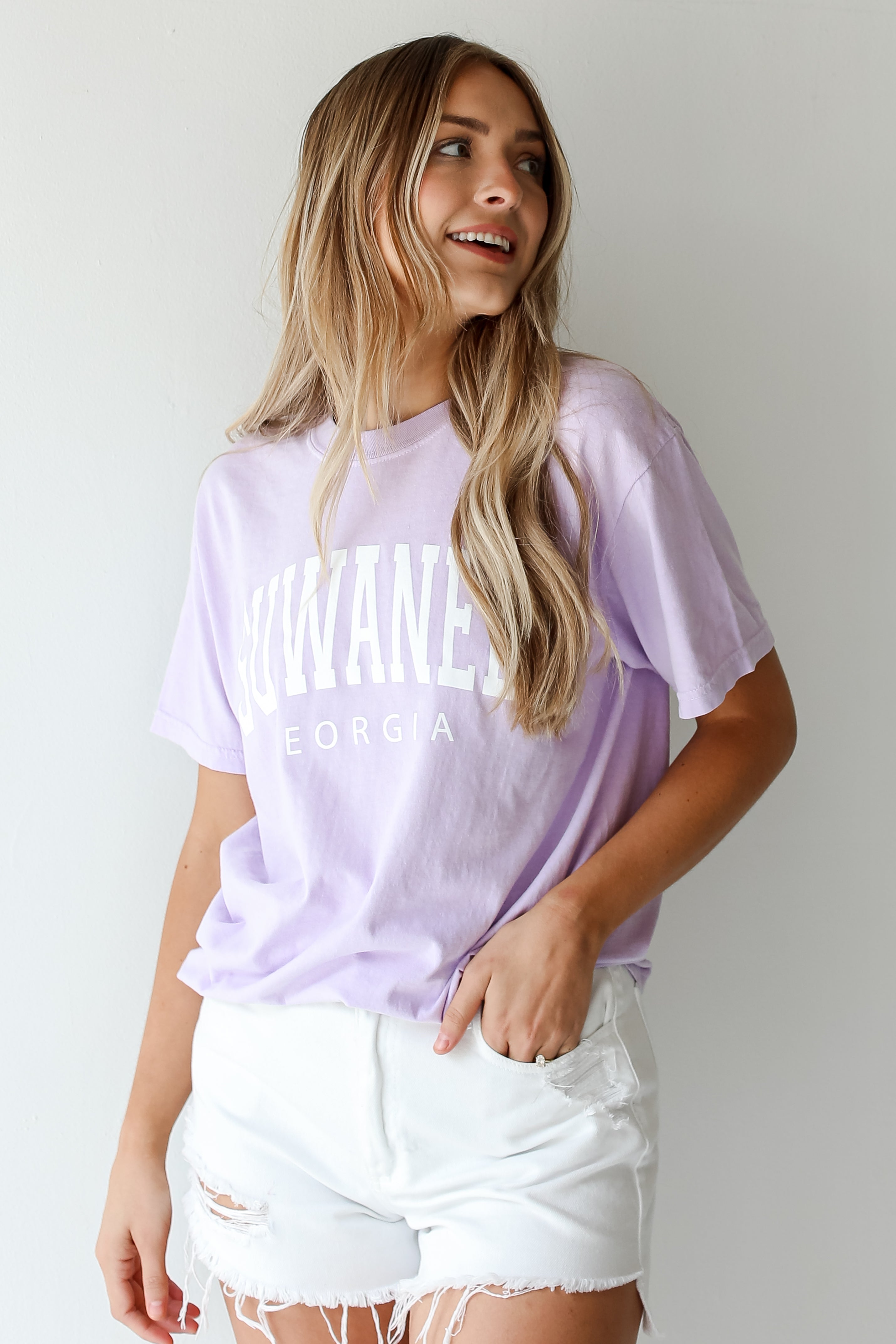 Lavender Suwanee Georgia Block Letter Tee tucked in