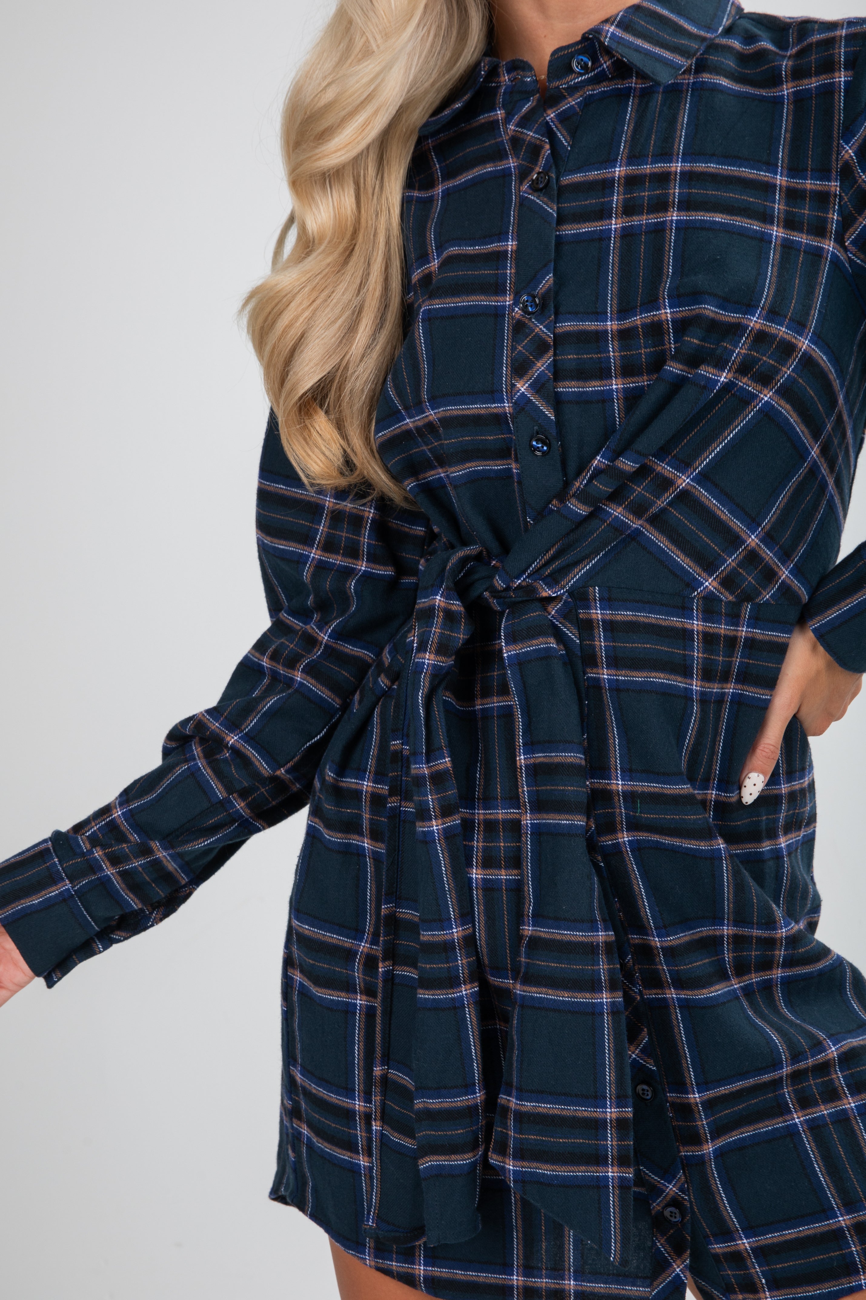 Navy plaid dress worn by a person on a plain background