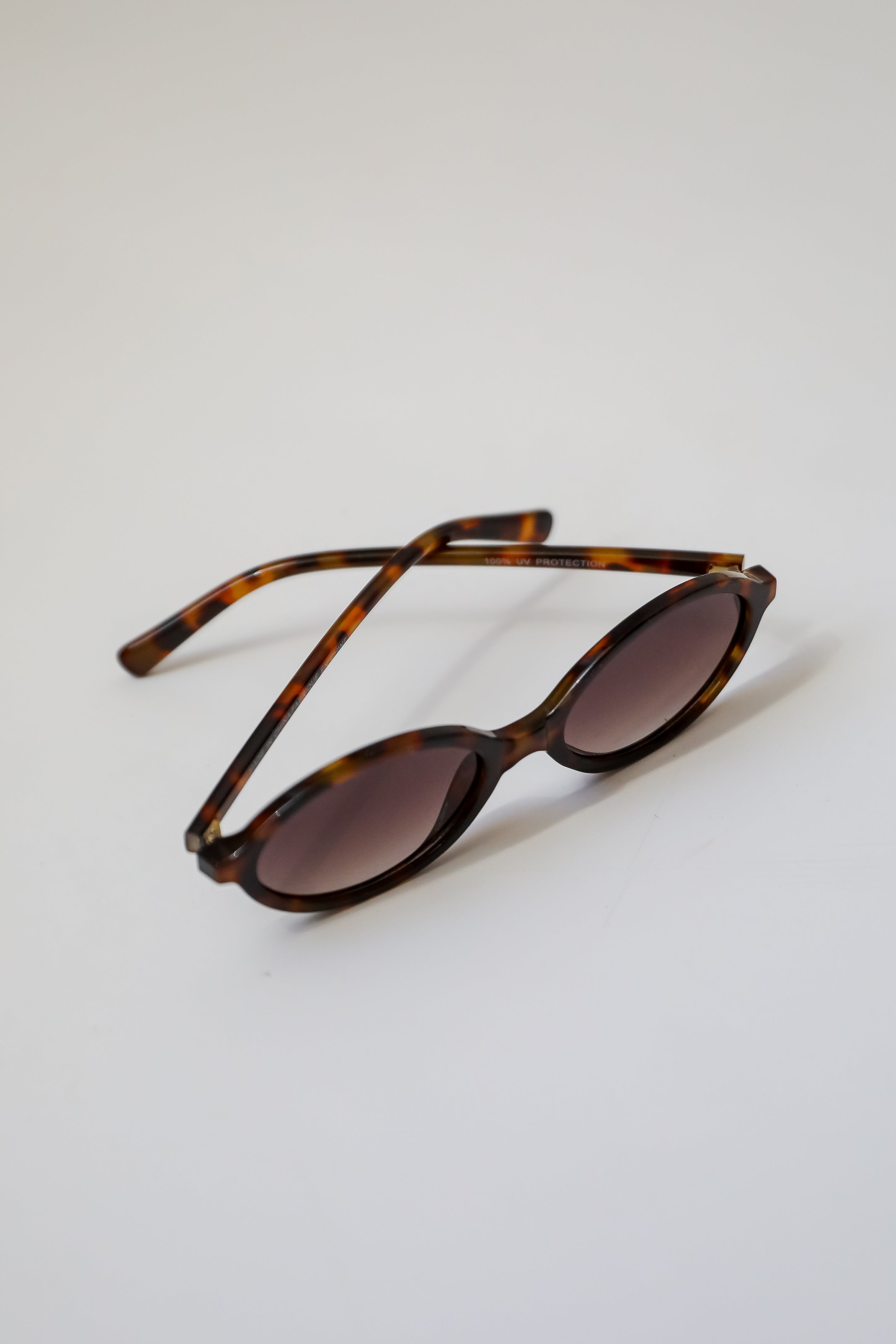 Comes In Waves Tortoise Oval Sunglasses