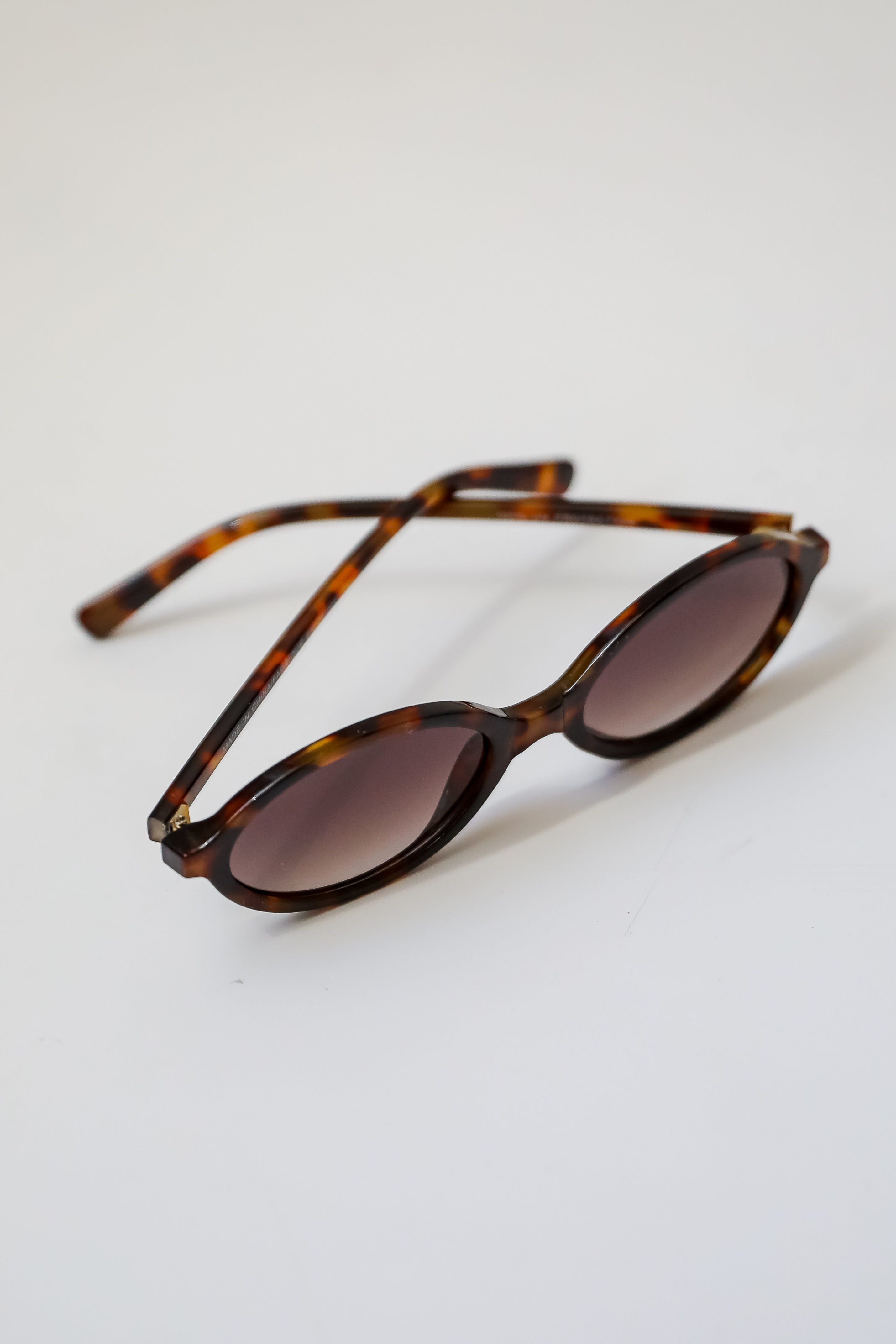 Comes In Waves Tortoise Oval Sunglasses