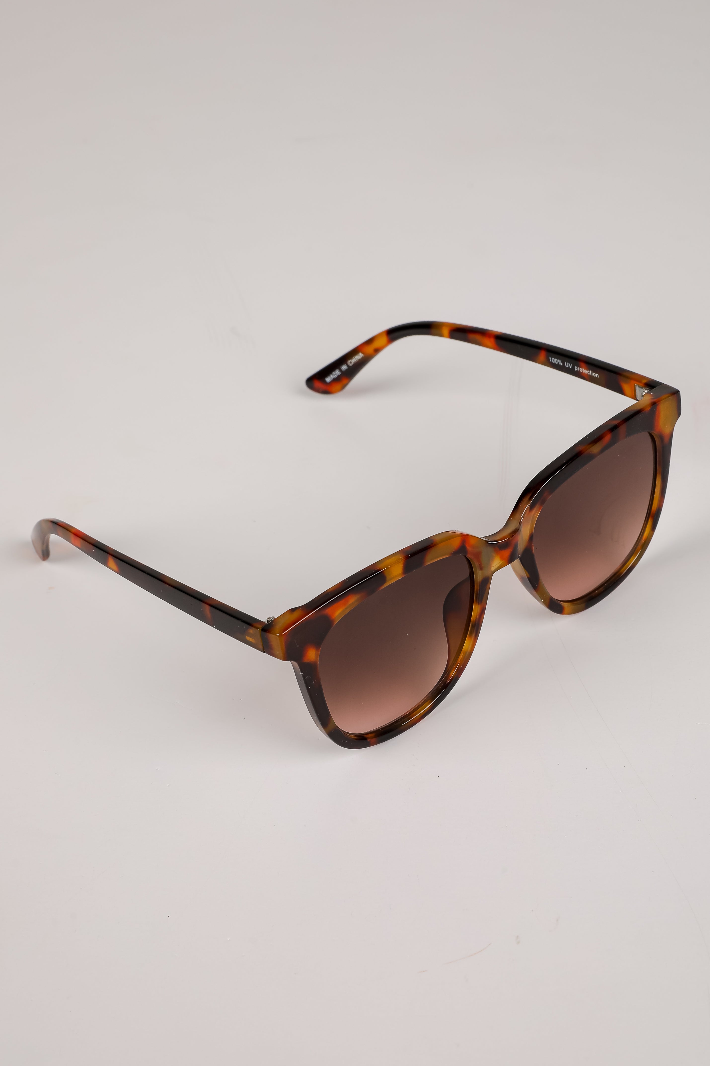 Glistening Lights Tortoise Round Sunglasses