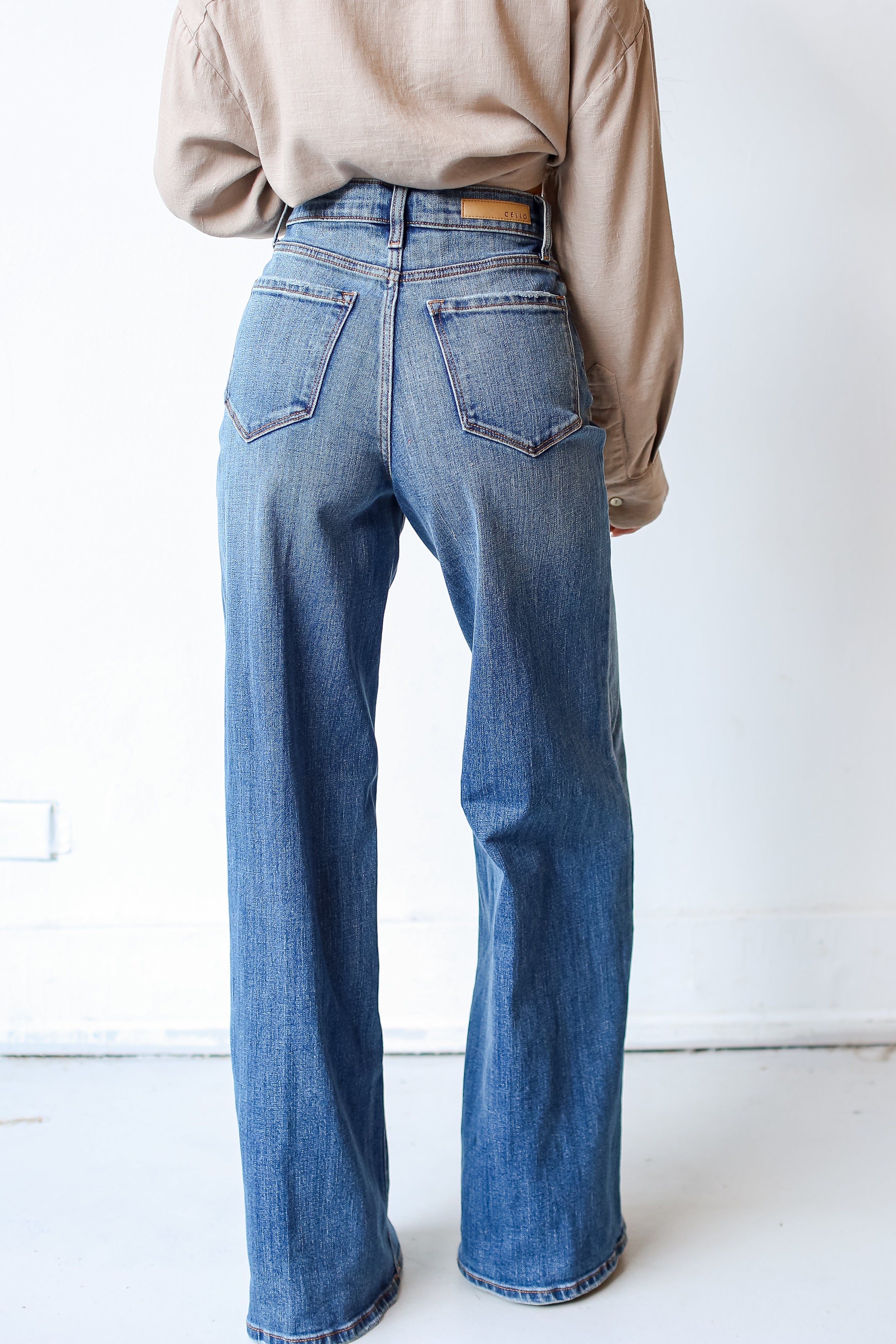 medium wash Wide Leg Jeans back view