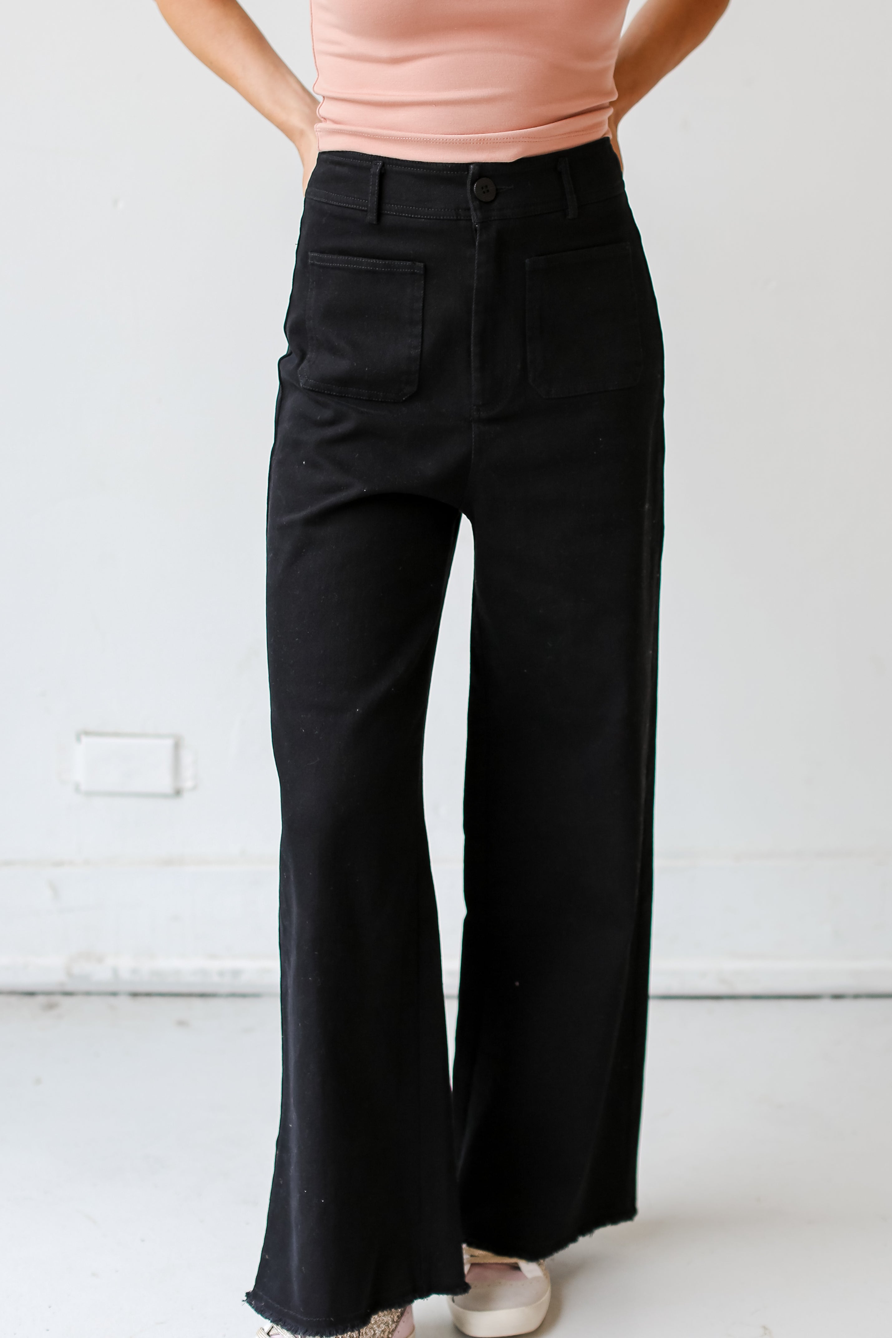 model wearing black Wide Leg Jeans