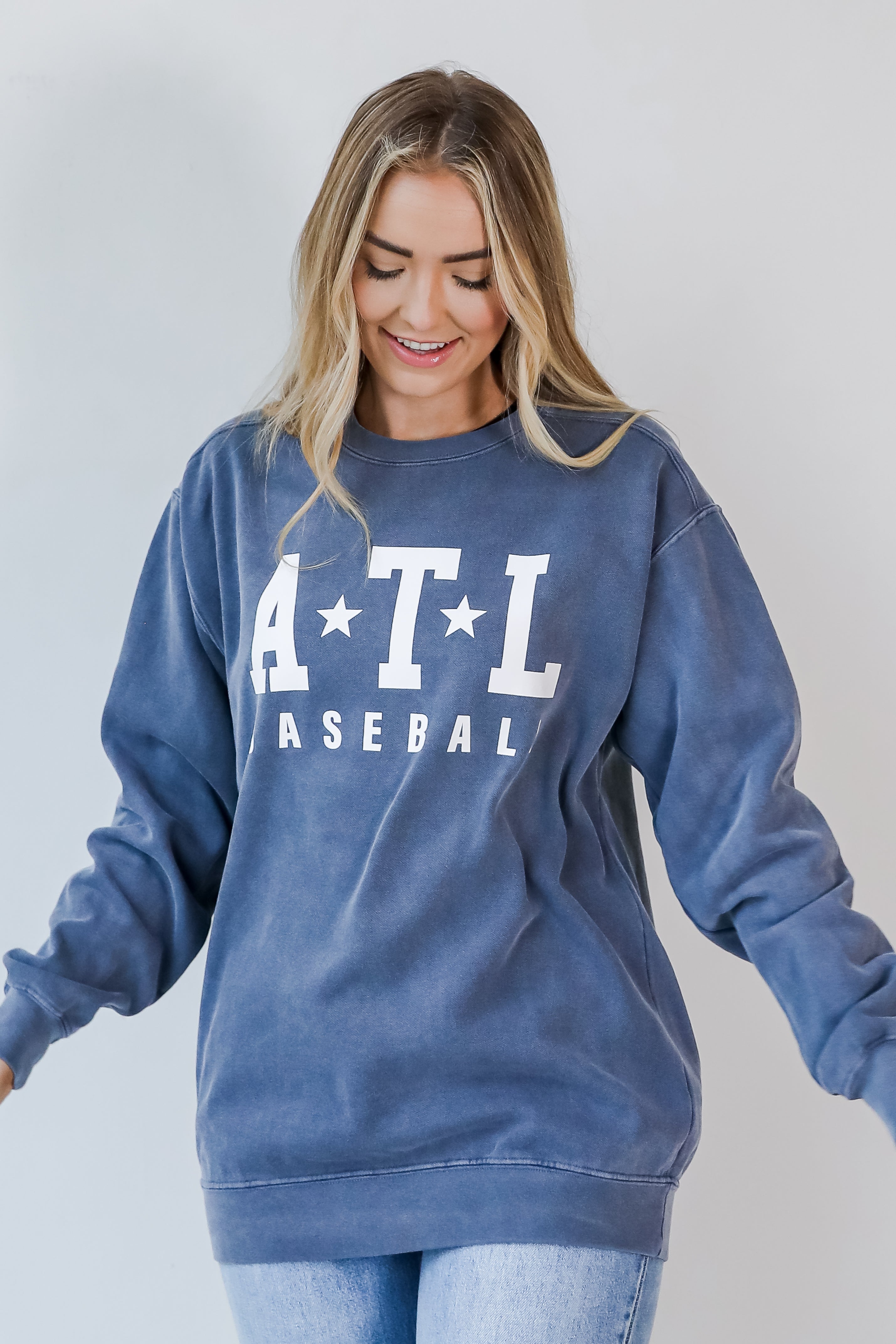 model wearing the ATL Star Baseball Pullover