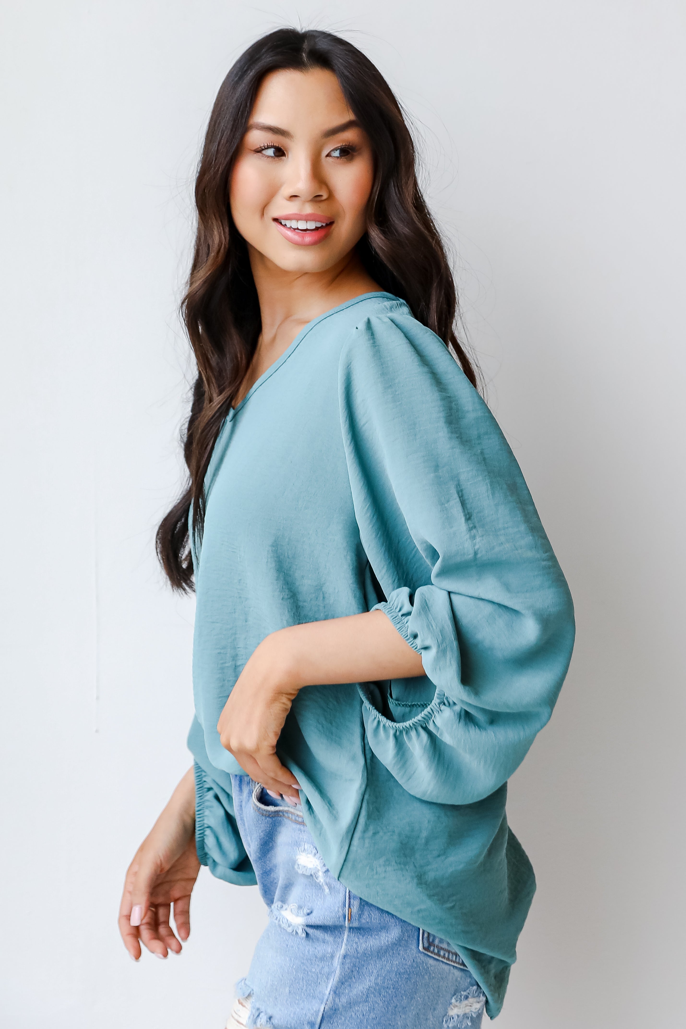 Blouse in seafoam side view