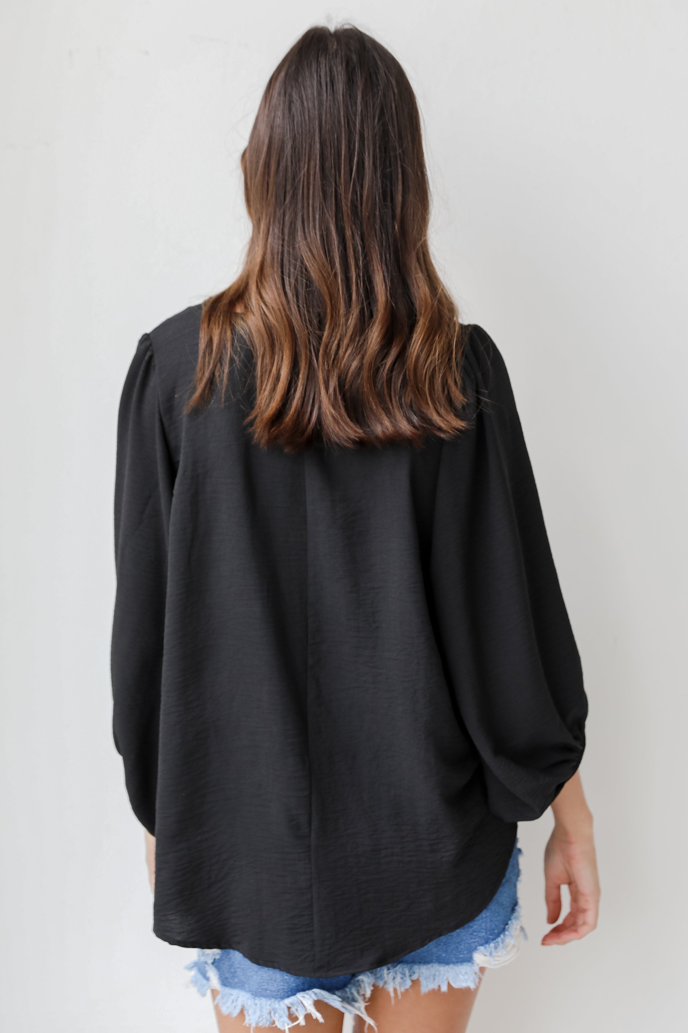 Blouse in black back view