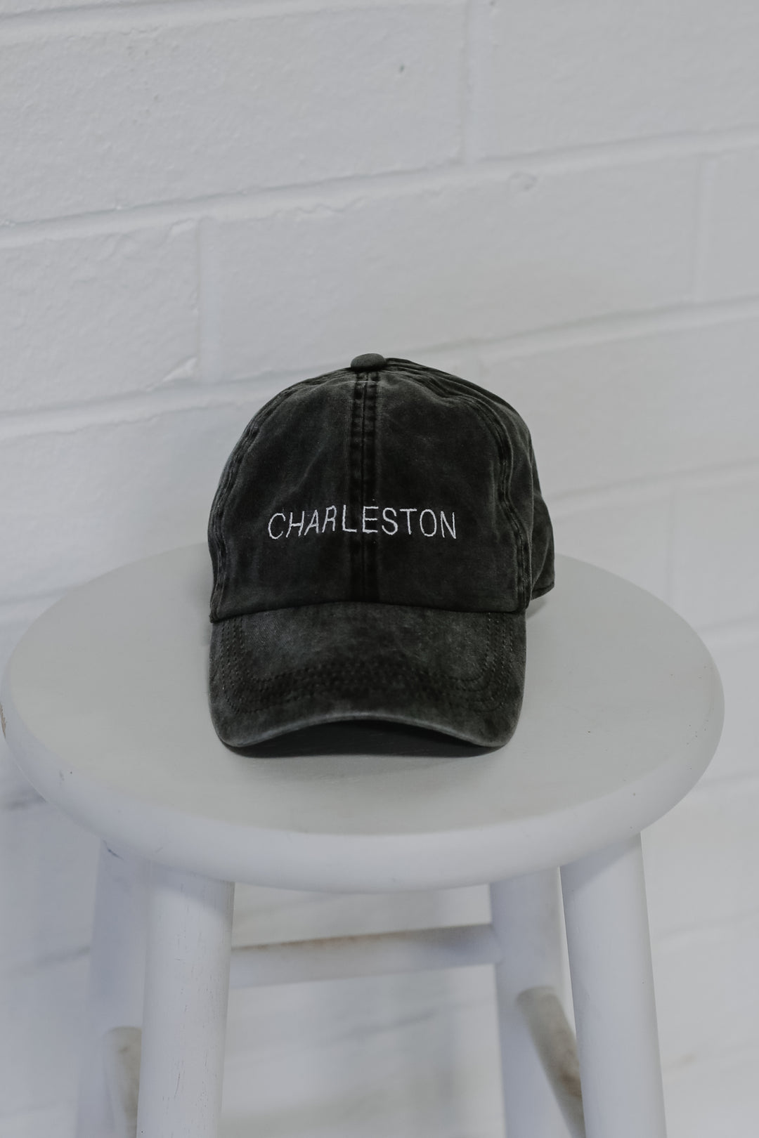 Charleston Embroidered Hat in black flat lay