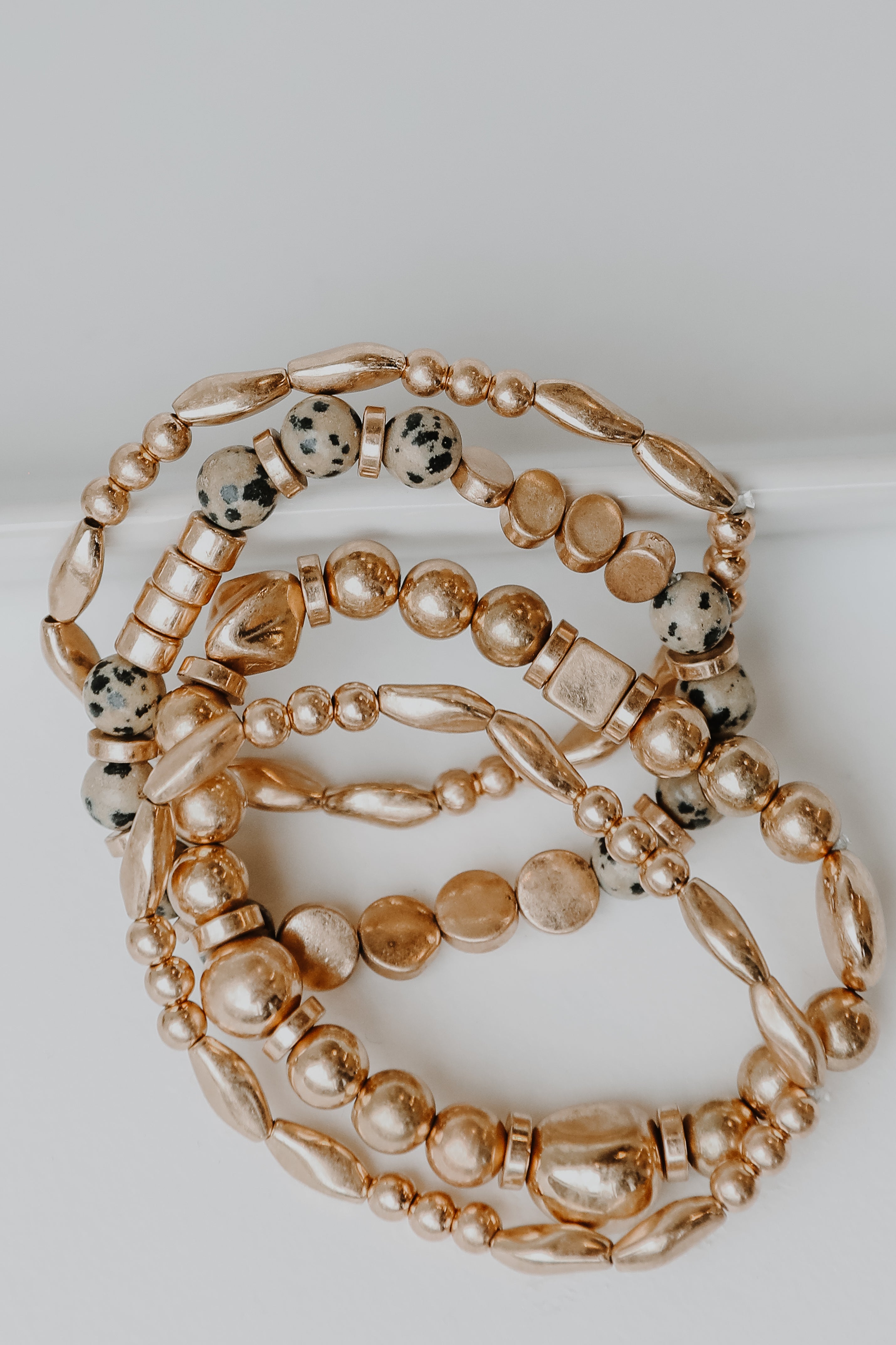 Gold Beaded Bracelet Set flat lay