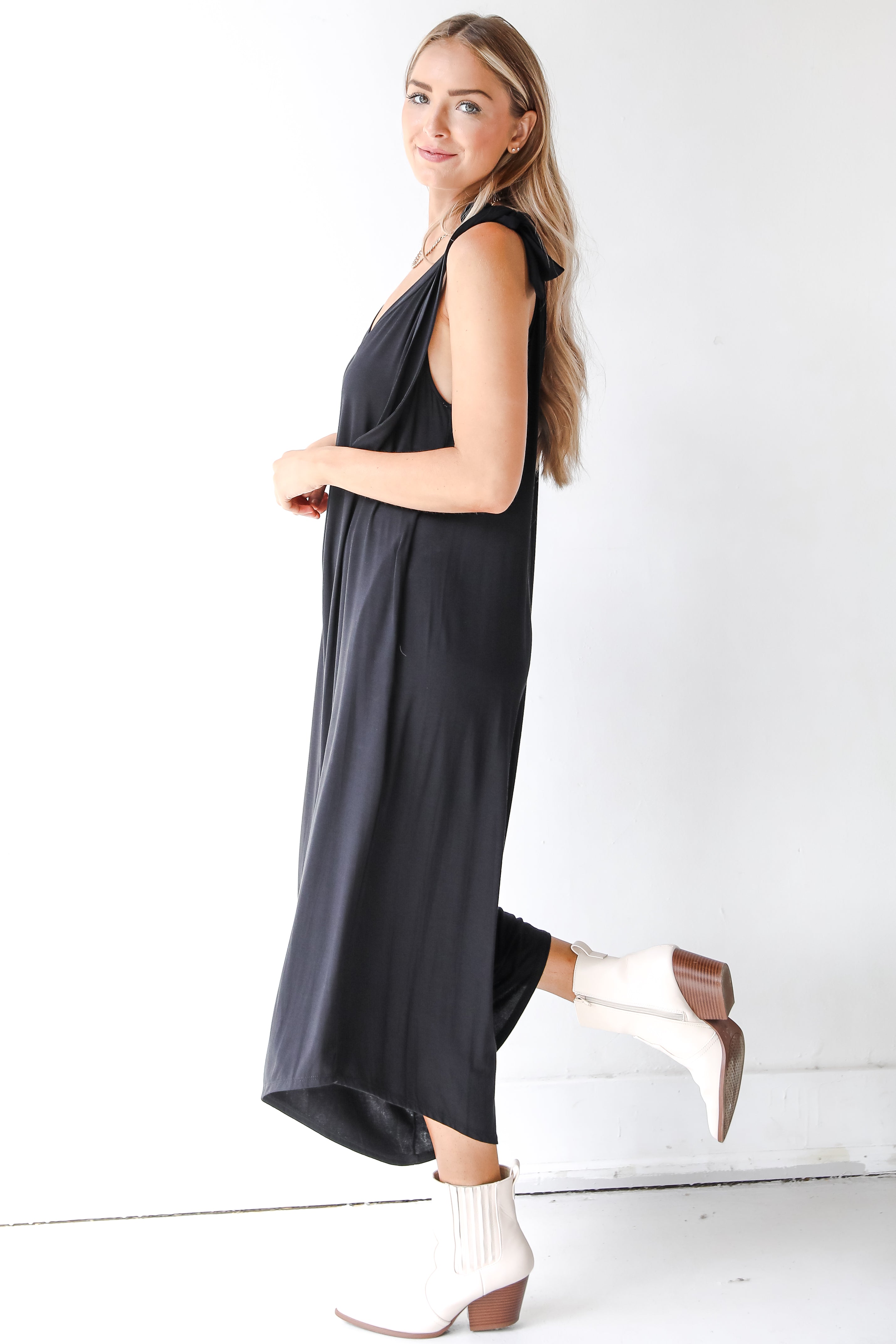 black jumpsuit side view